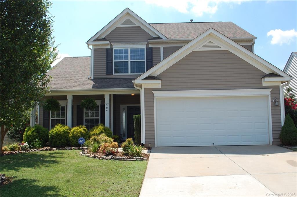 This 4 bedroom home has fabulous curb appeal w/ a rocking chair front porch and impressive landscaping. Large master on main level w/ spacious bathroom and walk in closet. Upstairs you will find 3 additional bedrooms, a full bathroom, & a large loft overlooking the living room. Patio off of breakfast nook. 2 car garage. Impressive interior finishes include picture frame molding, trey ceilings, 2 story living room, chair railing, & arched doorways. Neighborhood amenities include pool and cabana.