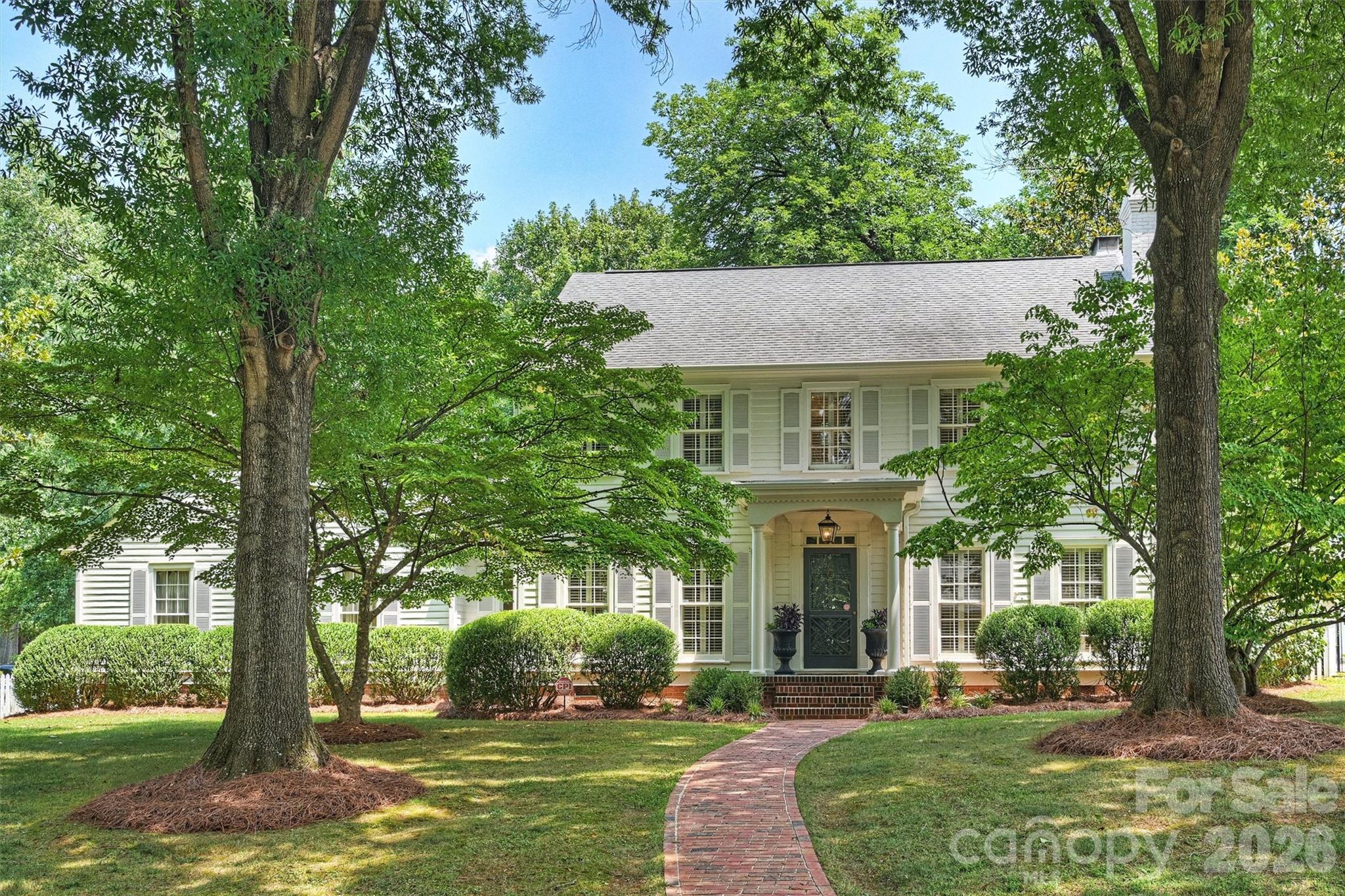 Nestled in one of SouthPark's most prestigious and sought-after neighborhoods, this exceptional two-story home offers an incredible opportunity to enjoy an unbeatable location with endless potential. Freshly painted on the exterior, the home boasts timeless curb appeal and is set on an expansive corner lot of more than half an acre.

Inside, hardwood floors span both the main and upper levels, creating warmth and continuity throughout. Elegant living and dining rooms feature plantation shutters, while the butler's pantry with decorative glass-front cabinetry provides both style and function for entertaining and adds a custom touch to the lower level. The spacious kitchen is designed for everyday living with a large center island, granite countertops, double ovens, abundant cabinetry, and a sunny breakfast area that opens to the inviting family room with custom built-in shelving, a fireplace, and beautiful views of the private backyard. A second fireplace adds charm to the formal living room. An oversized laundry room with a built-in desk and pantry-style storage offers exceptional flexibility for organization and daily living.

Upstairs, you'll find four generously sized bedrooms, all with walk-in closets, including a spacious primary suite with dual walk-in closets and an updated bath featuring a large walk-in shower.

The true showstopper is the outdoor setting. The expansive, fenced backyard provides exceptional privacy and room to create your dream outdoor retreat. Enjoy the screened porch and oversized patio today, with ample space to add a pool, outdoor kitchen, or expanded entertaining areas in the future.

Whether you choose to move right in or renovate to your personal style, this home presents a rare opportunity to create lasting value in one of Charlotte's most coveted locations.

Enjoy an unmatched SouthPark lifestyle with the ability to walk or bike to neighborhood favorites, Barclay Downs Swim Club, and top-rated schools including Selwyn Elementary, Alexander Graham Middle School, and Myers Park High School. Opportunities like this are few and far between—don't miss your chance to make this exceptional property your own.