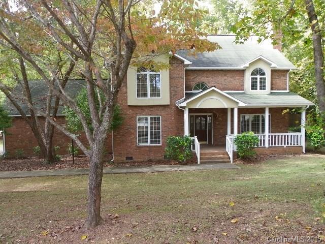 Beautiful brick home nestled on a corner lot! Nice, flowing floor plan with formals, big eat-in kitchen, living room can be 4th bedroom, adjacent full bath. Large kitchen with sunny breakfast nook.  Freshly painted interior, new floor coverings, 1 new HVAC unit, brand new appliances make this home move in ready! Easy access to restaurants, schools, and shopping. Enjoy the outdoors from the spacious deck overlooking mature trees.