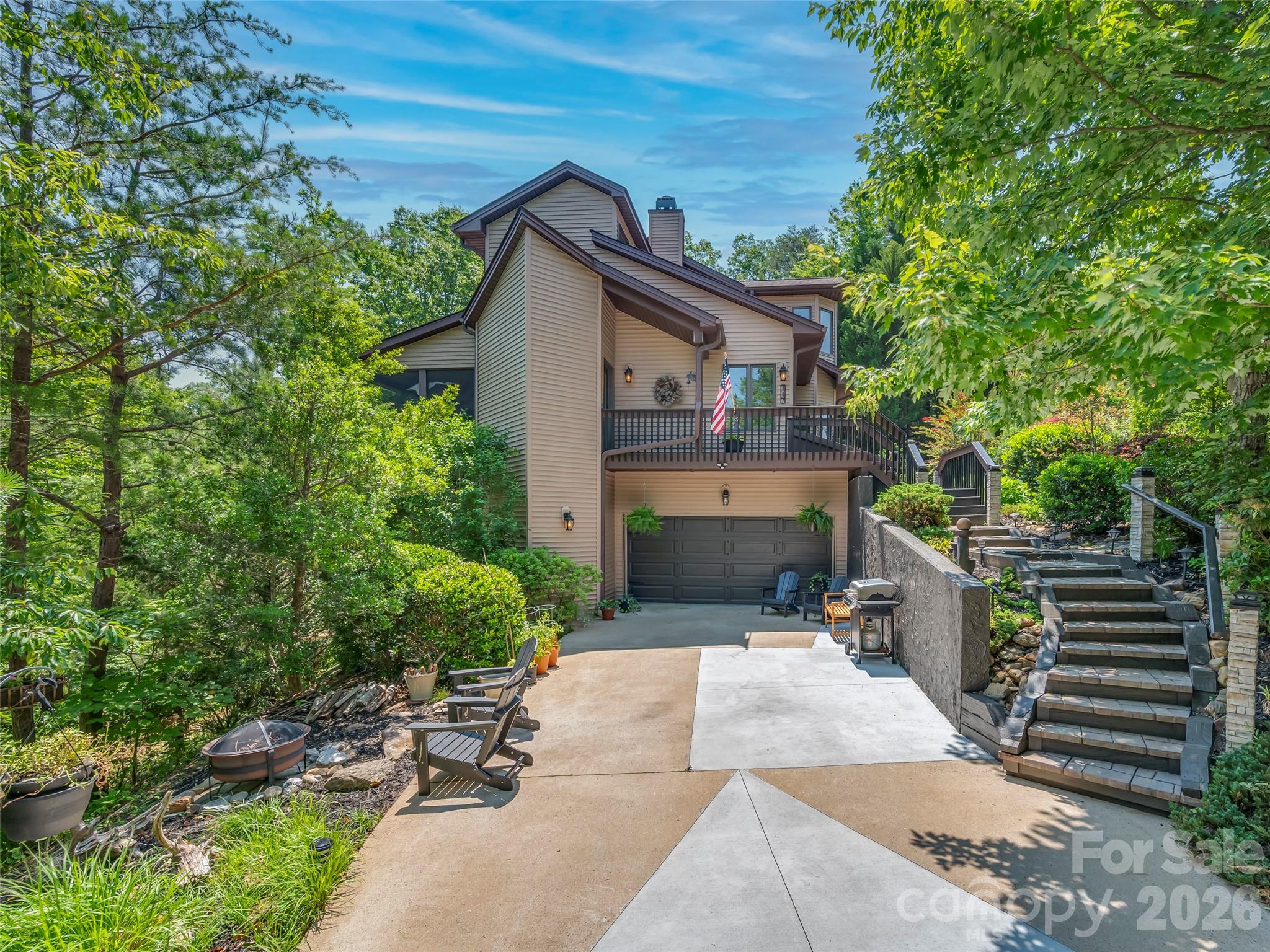 Seller will pay the $10,000 one-time Rumbling Bald initiation fee that entitles the owner to all Resort amenities.. Request a Showing—Negotiate—Make an Offer. This beautiful mountain getaway by Bittle Construction is in the exclusive "Ridge" neighborhood atop Shumont Estates only 5 minutes to the Rumbling Bald Resort gate. Walk into the tastefully decorated rooms in mountain and black bear decor. The myriad casement windows offer lots of light into the vaulted family room where the rock fireplace is the focal point. Enjoy time in the upgraded 
kitchen and morning room. Step out from the kitchen to the porch/deck smartly
furnished with complete patio package including gas log table. Look out over at the rock waterfall. The spacious master bedroom is bright with pastel colors, vaulted ceiling, wood beam, many windows,  and sitting area looking out and across to Bald Mountain. Step out to the master screen porch, vaulted and private. An additional room is suitable for office or dressing room. Large walk- in closet and bathroom. Off the kitchen area, step out to a large screened porch
fully furnished with tv, ceiling fan, hose bib, and a grilling deck. Porch also has exterior hard wood T&G flooring. The garage easily holds 2 vehicles, but now is being shown as a gameroom with custom 8' pool table, ping pong table, and dart board. A spacious work bench area is recessed to the side, and a large storage closet. Plenty of storage cabinets and SxS refrigerator. The cement floor has been painted blue sky. The crawlspace is huge with a tall ceiling, is encapsulated and dehumidified. 
Seller will pay the $10,000 one-time Rumbling Bald initiation fee that entitles the homeowner to all amenities.
All furniture, decor, entertainment and outside items are Negotiable.
House is perfect as an Airbnb, short term rental, or private residence.

 Unique exterior archtecture. No house on either side. Surrounded by trees and nature. Very private. Flat driveway with excellent drainage. Minimum traffic.
Only 5 minutes down the hill by golf cart to the Resort. Victory House restaurant at the entrance to Shumont Estates. Affordable utilities. 5G fiber internet.
Come see for yoursef. Very flexible showings available 7 days a week. The Resort has everything for everybody.

New driveway concrete areas.  4/25
Whole-House Water Shutoff Valve installed.  3/25
New Frigidaire/Gallery Refrigerator.  10/23
New 3T 15 SEER Heatpump and Air Handler. 5/25
New 50 Year Architectural Shingle Roof. 8/24
New 1.5 Ton 16 SEER Heatpump and Air Handler installed 1-21-2026