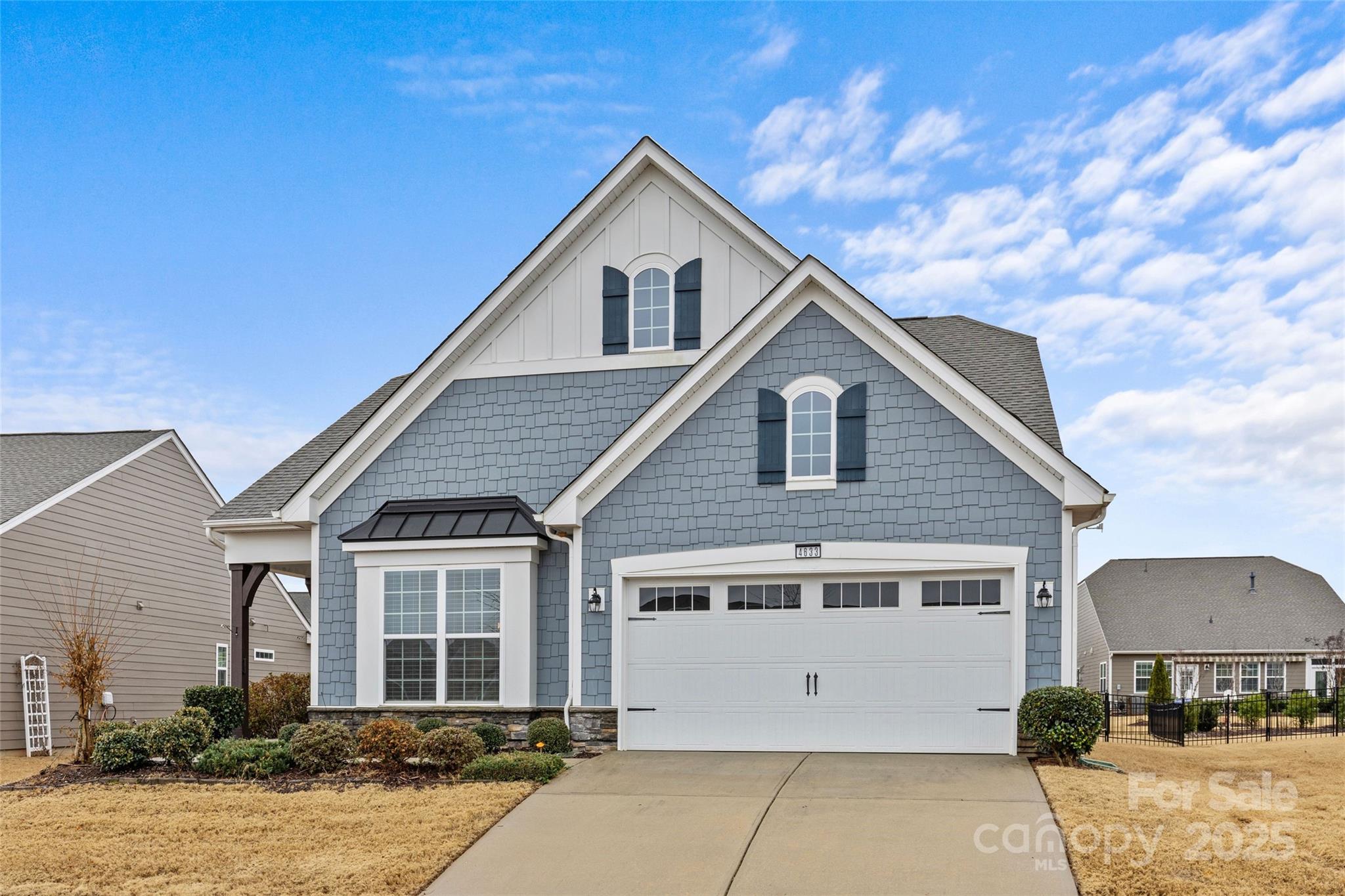 This charming home, meticulously cared for, is nestled in the desirable, gated, 55+ Tree Tops community—adjacent to a peaceful green area where neighbors gather. The open floor plan boasts a neutral palette and an abundance of natural light. The kitchen is equipped with stainless steel appliances, a spacious island, and sleek quartz countertops. The original gas stove has been replaced with an electric one for safety, the gas connection has been capped. Additional highlights include ample cabinet space and a generous pantry for storage. The home features luxury vinyl plank flooring throughout, with tile in the bathrooms. Storage is plentiful, with attic access available from both the primary closet and the garage. Step outside to a wonderful, screened porch that leads to a paver patio, complete with a built-in gas grill—perfect for entertaining or relaxing. The fenced backyard is beautifully landscaped, showcasing mature hydrangeas that add a touch of natural beauty.