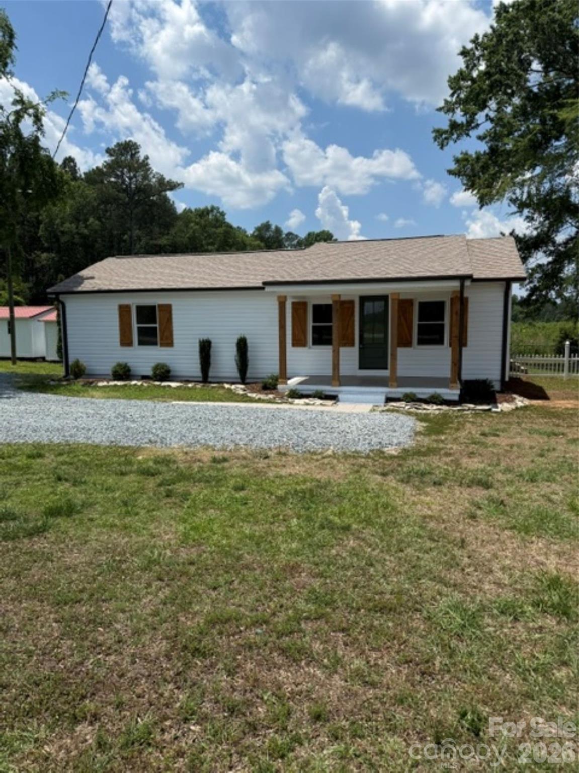 Welcome to this charming completely updated gem that's ready for its new owners! This home offers comfort, character, and convenience all in one. Fenced yard perfect for pets, play or entertaining. This home offers a bonus room that could be used for bedroom, office, playroom, etc. Property also includes outbuildings that provides plenty of extra storage or work space. Ideally located close to Lake Tillery. Don't miss your opportunity to own this beautifully updated home.