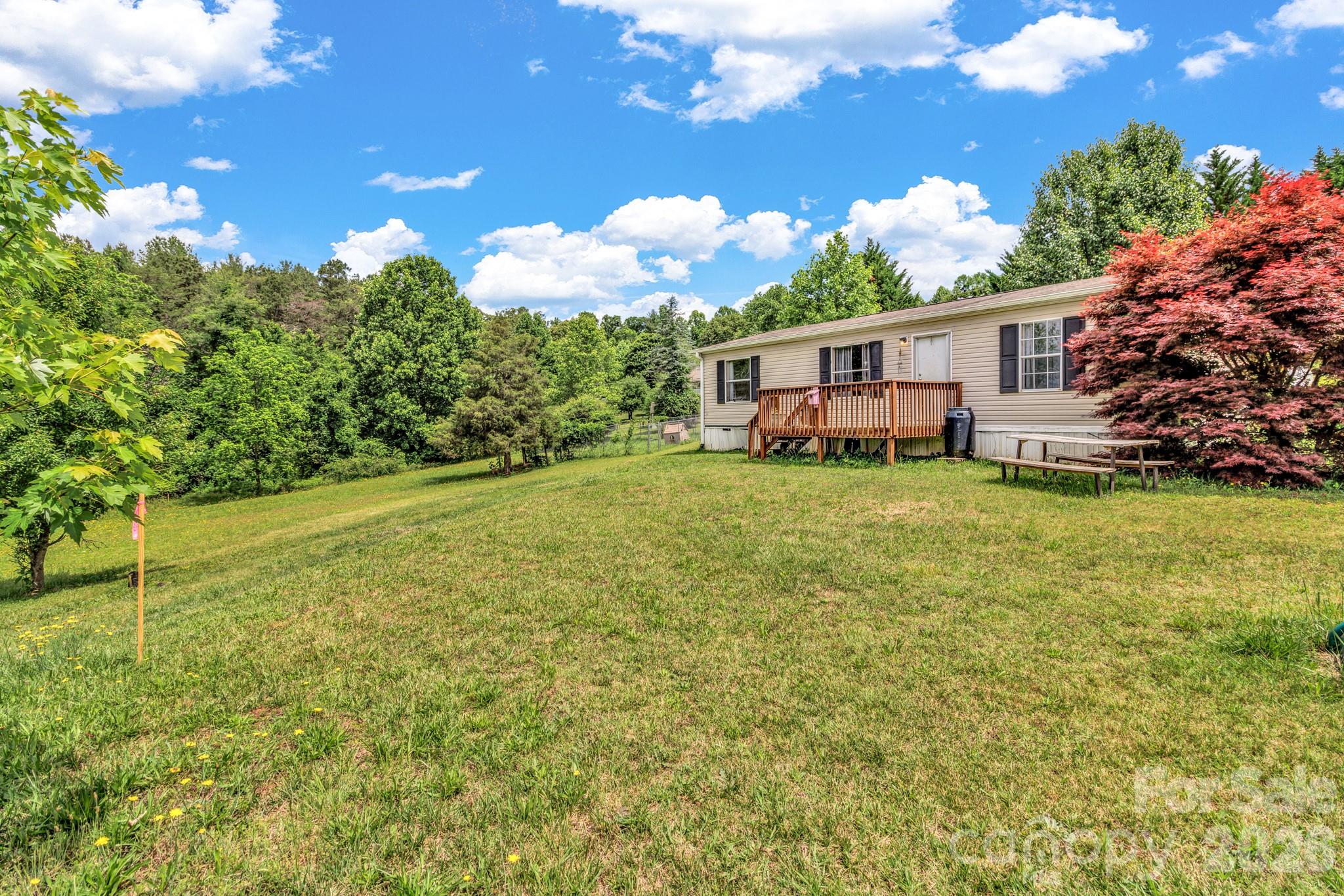 Investor special with excellent potential just 8 minutes from Weaverville! This recently subdivided double-wide sits on a generous lot and offers a great opportunity for investors, flippers, or buyers looking to renovate and make it their own. The home will require renovations and is being sold as-is. It is currently served by a shared well, with a shared well agreement in progress. The title has been retired, and the subdivision has recently been completed. Enjoy the peaceful setting, convenient location, and ample outdoor space with plenty of possibilities. Whether you're looking for your next investment project or a property to customize, this one is full of potential!