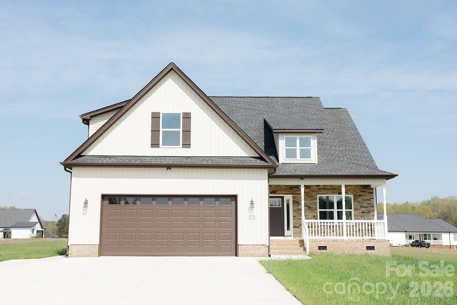 New construction home on one acre lot in a newer subdivision. All lots in subdivision are minimum 1 acre. This plan has 4 bedrooms 3.5 baths. Open floor plan. There are two primary bedrooms/bathrooms on the main floor. Primary bathroom has a free standing soaker tub and separate walk in shower. Second primary bedroom has a walk in shower. Kitchen includes an island with seating space and is open to the dining room and great room. Great room has a stone gas log fireplace and door to a large covered rear porch. Large laundry room and a drop zone at garage entrance. Second floor has two bedrooms and a large bonus room. It also features a sitting area, large bathroom and lots of storage. House complete. Listing agent is builder and related to owner.