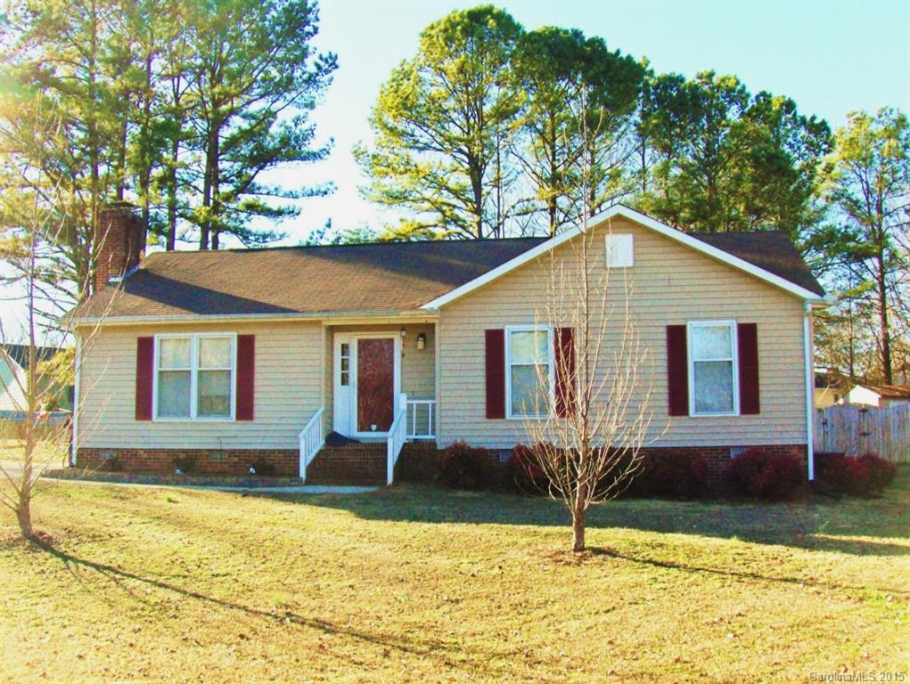 Gorgeous ranch home with 3 bedrooms and 2 full baths in a cul-de-sac lot on .46 acre. New, beautiful wood laminate flooring in the great room. Living area is open and spacious. The great room boasts a vaulted ceiling accented with wood beams, a brick fireplace with gas logs. Large kitchen has new ceramic tile. The yard has a new privacy fence - great for children and animals. Great neighborhood - no city tax - no HOA! USDA-approved area.