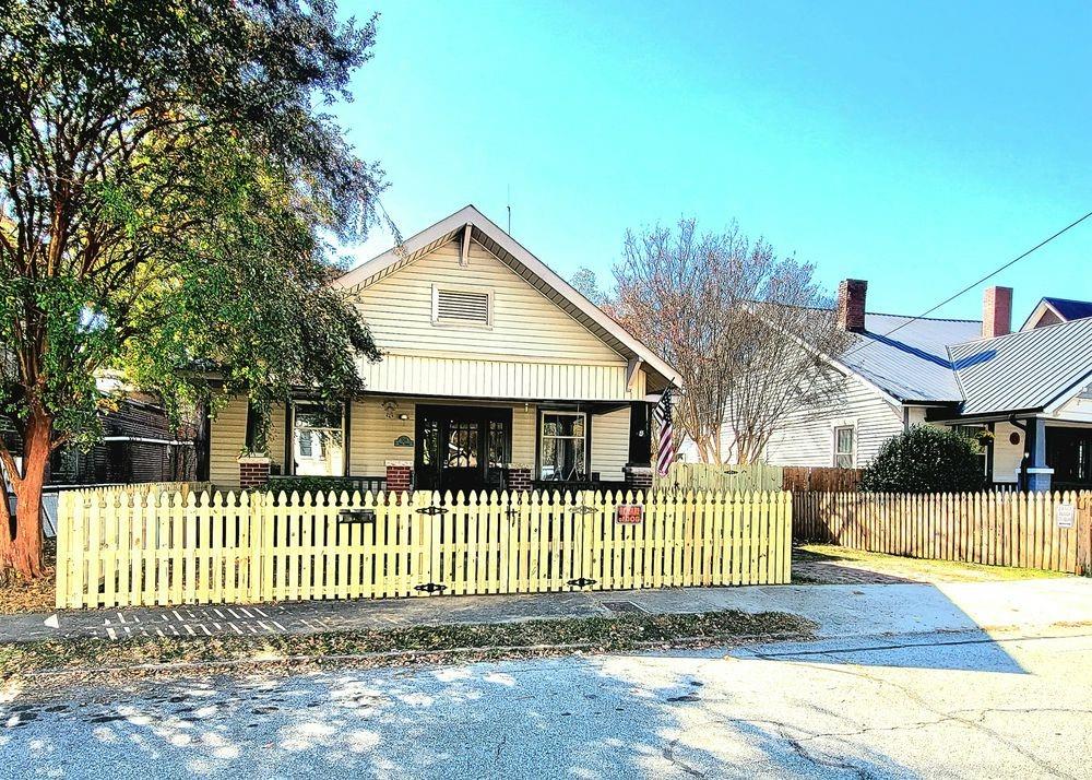 New Listing  This is being used as a rental sellers have never lived in home.  They replaced roof, HVAC, electric stove remains. Very nice private back yard area for enjoying your family or pets back deck area with pic nic table.  Large covered front porch for rocking chairs.  Detached garage 444 sq feet