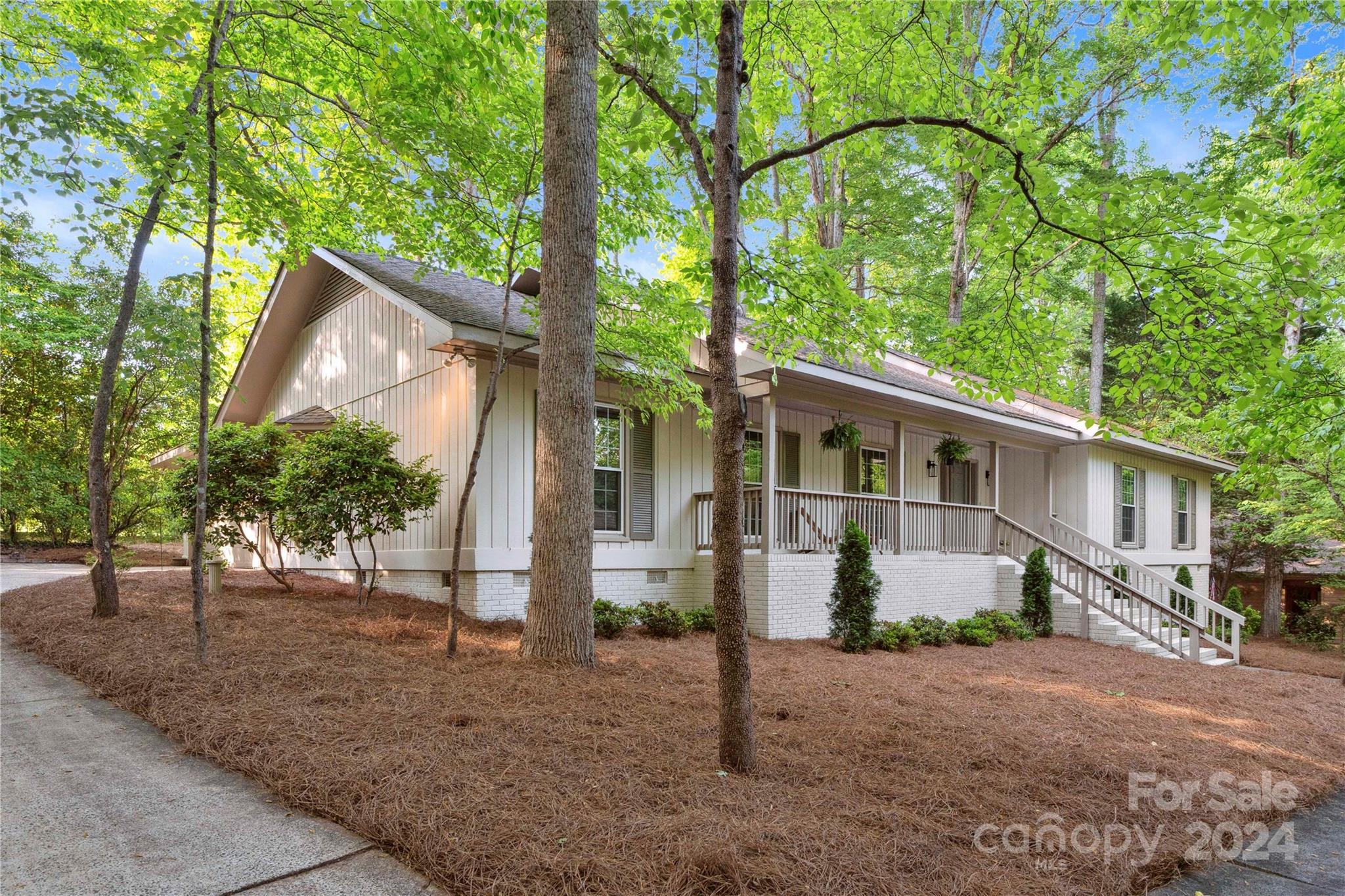 Priced over $50k below appraised value!!!! Come see this remodeled ranch home located in the gated community of River Hills! Beautiful hardwood flooring throughout a majority of the home with tile elsewhere. Heated and cooled sunroom overlooking the wooded PRIVATE back yard. This home has a completely new kitchen w/ quartz countertops, stainless steel appliances, brand new primary bathroom, and other updates throughout. Dedicated a mud/laundry room off the garage. The oversized side load garage features an amazing workshop space and epoxy flooring. The neighborhood amenities include 24/7 security guards, a waterfront beach park, walking trails, dog park, playground, and much more! River Hills Country Club is located within the neighborhood and available to join as an additional membership. Listing agent has ownership interest in property.