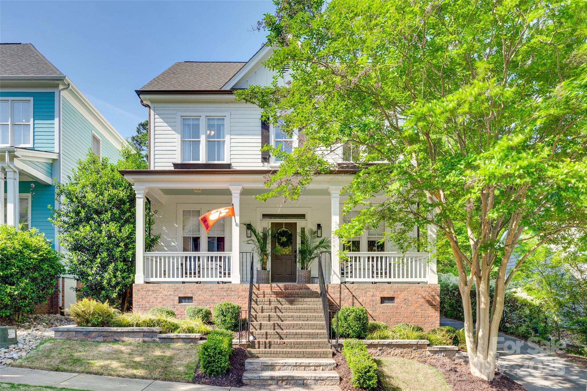 This Baxter Village beauty at a new price is ready to welcome you home! Prepare to be wowed by the renovated main floor featuring a gourmet kitchen set to impress any chef—high-end WOLF gas range, custom cabinetry, quartzite countertops, large island, walk-in butlers pantry. The open kitchen flows seamlessly into the breakfast nook & cozy living room, a perfect gathering space. The primary suite has dual closets & ensuite bath, complete w/dual vanities, a large tub, & separate shower. Add'l features include a dedicated home office, sitting room w/custom built-ins, guest suite w/full bathroom, spacious laundry room w/marble counters, bonus room w/endless possibilities & walk-in storage, mud room, & screened porch w/storage below. New carpeting in all 5 beds & closets! Long driveway & attached garage provide plenty of parking. Prime location, easy access to the Community Center, pools, playgrounds, tennis courts, walking trails & all that Baxter has to offer, easy commute to Charlotte.