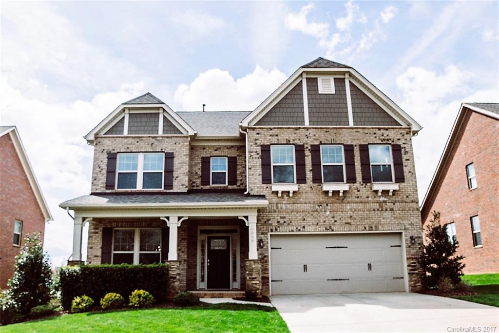 Welcome Home to this Pristine Brick Beauty in Desirable Barber Rock! The gorgeous entryway leads you into this fantastic open floorplan! The main level features a gourmet kitchen, great room w/gas logs, office/study, beautiful dining room and guest suite w/ full bath. Head upstairs to a luxurious Master Suite, 3 oversized bedrooms plus a large bonus room! Relax under the custom pergola overlooking the large, flat backyard, bordering trees and peaceful views! 5BR+Bonus, 3BA! Fantastic Location!