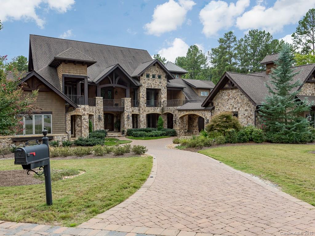 This home has everything you could possibly want and more.1 acre private wooded lot with 4 car detached garage, saltwater pool and spa and a fenced yard and that's all before you get inside. The main level of this amazing home is open, inviting and perfect for entertaining. The gourmet kitchen boasts a larger 6 burner gas stove,3 ovens,microwave drawer, warming drawer,loads of storage and wine closet. Spacious master and guest suite,billiard room,family room,formal space and amazing veranda.