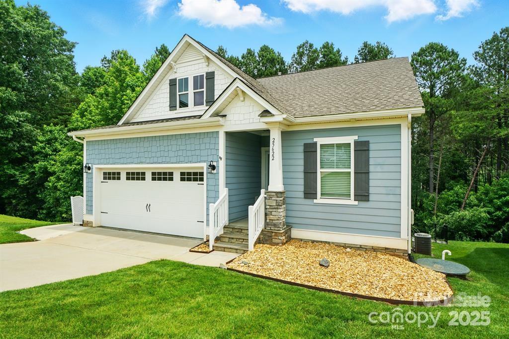 Stunning 3-bedroom, 3-bath - Edgewater Golf / Resort community home with a fenced back yard and a 2 car garage. Tremendous layout. Beautiful heated basment with bedroom, full bath and living room.  Kitchen has stainless appliances and plenty of counter and cabinet space. 2nd fridge in the basement with a huge storage space. Faux wooden blinds, gas stove, washer and dryer included.  Garage floor has epoxy treatment & a private screened in porch. Both comfort & connection, this home offers ample space for entertaining & everyday living.  An upper and lower deck oasis with breathtaking water views of Fishing Creek Lake.