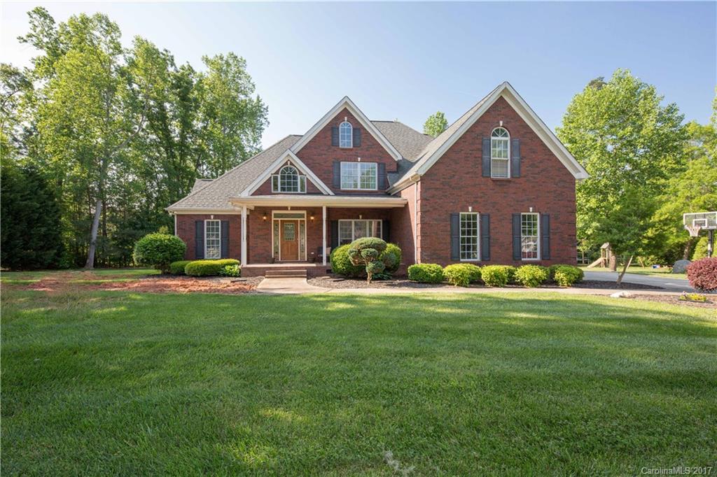 Welcome home!  Image yourself sitting on the deck enjoying your private backyard, or entertaining family and friends during the holidays.  This home has over 3000 sq ft with approx 2 acres, four berooms, three bathrooms and a large bonus room. Master on main has large walk in closet and private access to deck.  Relax in your master bath with wirlpool tub.  Cozy up by the fireplace during cold winter nights or cool off in the pool on hot summer days.