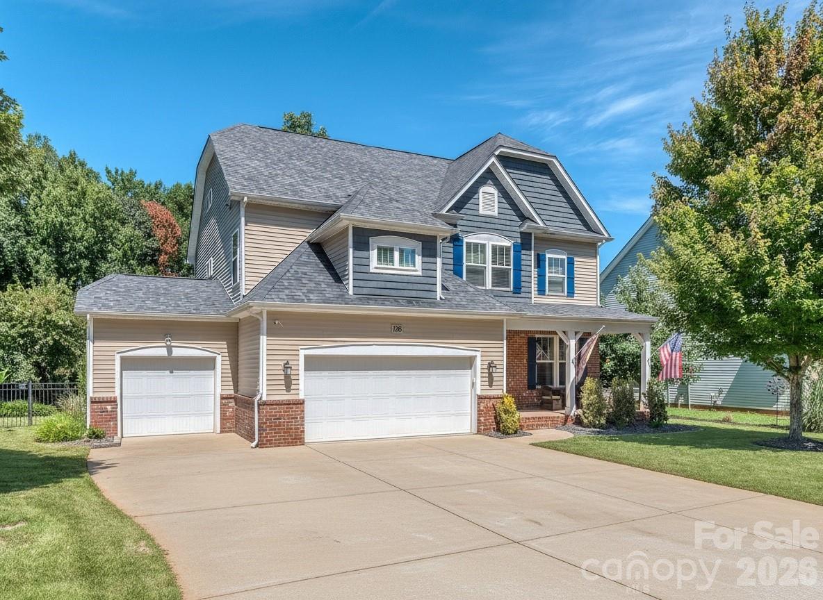 Conveniently located just across the Buster Boyd bridge in one of Lake Wylie's most desirable communities - Amazing back yard with heated inground saltwater pool, built in outdoor kitchen with natural gas grill, covered pool cabana with Trex decking, outdoor TV area, custom firepit and a full TIKI bar! Beautifully landscaped yard backs to the community common area for extra space & room to play- Rocking chair front porch- Open & airy floorplan with great natural light- Dining room / Flex space with coffered ceilings- Kitchen has a gas cooktop and large center island with bar seating- Living room with gas log fireplace & kickout storage closet that's perfect for toys or all the day to day extras-  Sunroom with built in storage leads to your backyard oasis- Primary suite with walk in his / her closets, relaxing soaking tub, walk in shower, private WC & dual basin, raised height vanities- Generous secondary bedrooms / closets- Full laundry room with project sink & extra storage cabinets- Huge 3rd floor suite with private bath- Finished full 3-car garage with epoxied floors and built in commercial ice maker- Home has a perfect layout to accommodate all your needs- Community with lake access is great for dropping in your Paddleboards or Kayak- Desirable Clover school district and low York Co taxes - All your day to day amenities are just outside the community entrance - Shopping, Dining and Entertainment all within minutes - Just too much to list!  Call anytime for your private showing and come see what Lake Wylie living is all about!