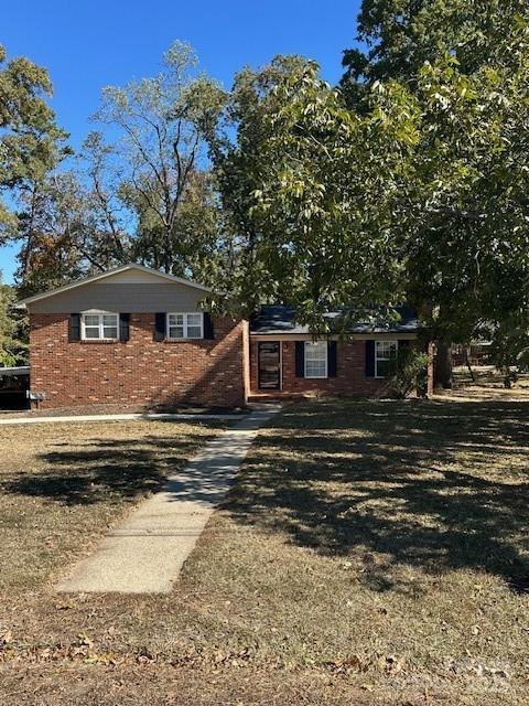 PRICE REDUCTION!!!!!!!!
WELCOME to this lovely, well maintained ALL BRICK home on a beautiful lot, fully finished basement that could easily be used as an apartment if one should desire!  Like NEW appliances which ALL convey with exception of washer/dryer in basement laundry room.  Cook glass stovetop has a convenient air fryer option to eliminate messy kitchen frying endeavors!  The ROOF, which are architectural shingles is only approximately 3-4 years old according to previous owners relaying this to present owner which will give new buyer peace of mind to know that a very big part of costly maintenance is already taken care of.  The Living Room does host a warm and toasty woodburning stove for the brisk FALL and WINTER months. Window treatment hardware will remain but all drapes will not convey.  This traditional upper/lower home gives one the impression it's much more spacious than it actually is with its open floor plan on the main level.  In the living areas you'll have a mixture of ceramic tile, carpet and hardwood flooring options in this home. All bedrooms have hardwood flooring. Primary bedroom has its own private full bath, and full bath downstairs in basement has been updated with newer sink/faucet.  The basement would accommodate a bar/entertainment area easily, cozy den, playroom or office; the choices are endless with this fully finished basement!  NEWER ROOF, NEW ELECTRIC WATER HEATER was just installed (2025) for buyer's peace of mind! THE ENTIRE CRAWLSPACE IS ENCAPSULATED WITH PLASTIC VAPOR BARRIER!!  There is a security system in place; but occupant of home nor Sellers have ever activated the system with a company to have monitored. This home is located only minutes from downtown Concord...don't miss out on this gem, get your buyers settled in this traditional, upper and lower home just in time to enjoy the large front/back yard with the planting of your seasonal flowers! The attic is not accessible by hallway stairs but does 
have access entry through space in the primary bedroom closet.  NOTE: Please allow a 2-hour notice when making an appointment with showing service to see the home!  Home has also been professionally measured and a copy is placed in the attachments file for all buyer agents to review with your clients.  Thanks for showing!