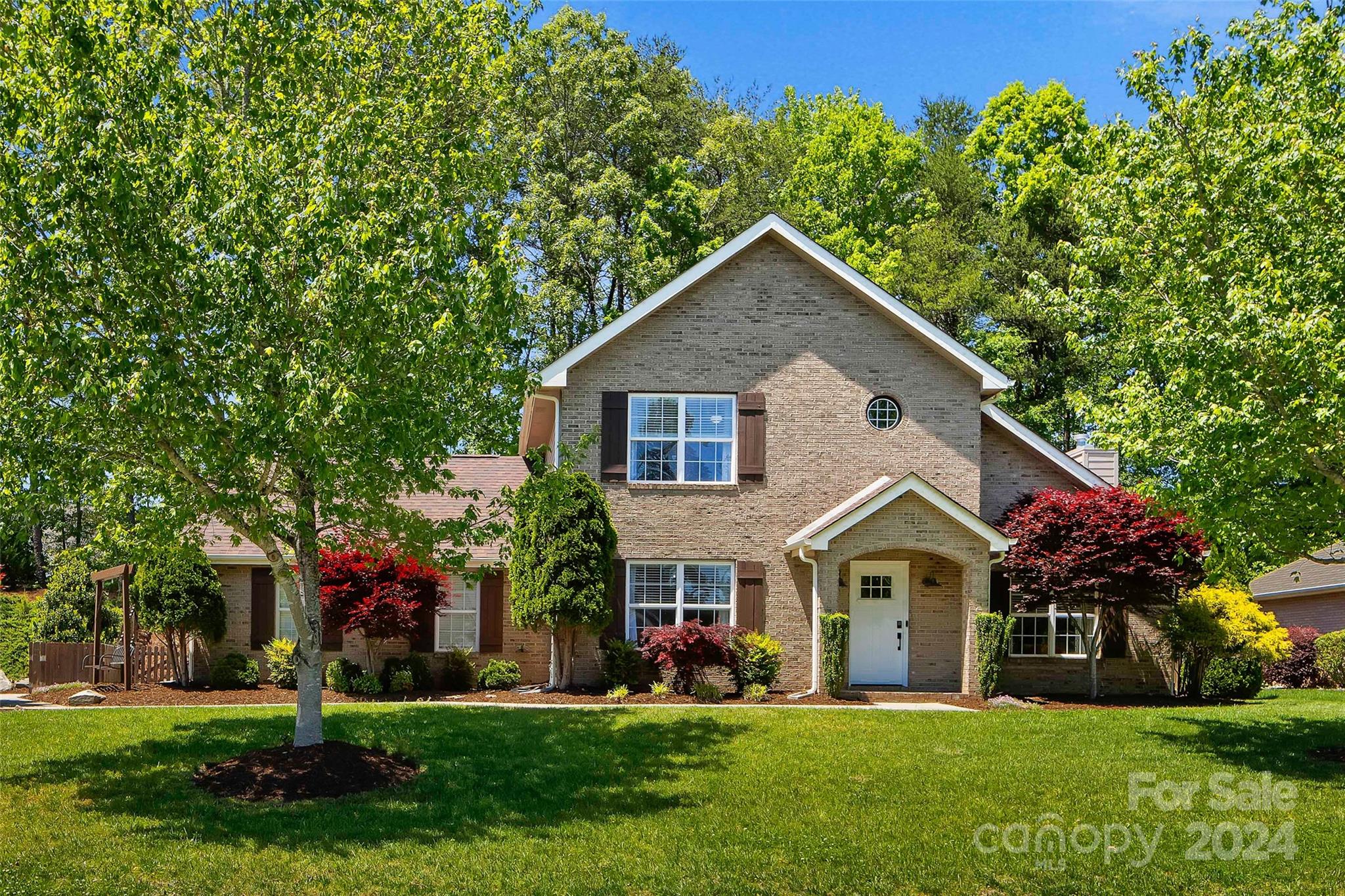 ***MULTIPLE OFFERS RECEIVED*** This beautiful home in the Palmetto West subdivision of Fort Mill is filled with several upgrades and charm. This house showcases hardwood floors in the primary bedroom and downstairs living area along with elegant board and batten trim. The updated kitchen features quartz countertops, a tile backsplash and stainless steel appliances. Enjoy quartz countertops and heated tile floors in the exquisitely renovated primary bathroom. Recently installed carpet can be found upstairs along with two more sizable bedrooms and a Jack and Jill bathroom. Additional improvements include a tankless water heater (2017), landscape lighting and a natural gas line conveniently setup for an outdoor grill. The beautifully manicured lawn features a storage building and fire pit on nearly a half acre lot. The flat side-yard is hard to find and perfect for soccer or flag football games with family and friends. Exterior painted (2021), HVAC (2018). Extremely desirable schools.