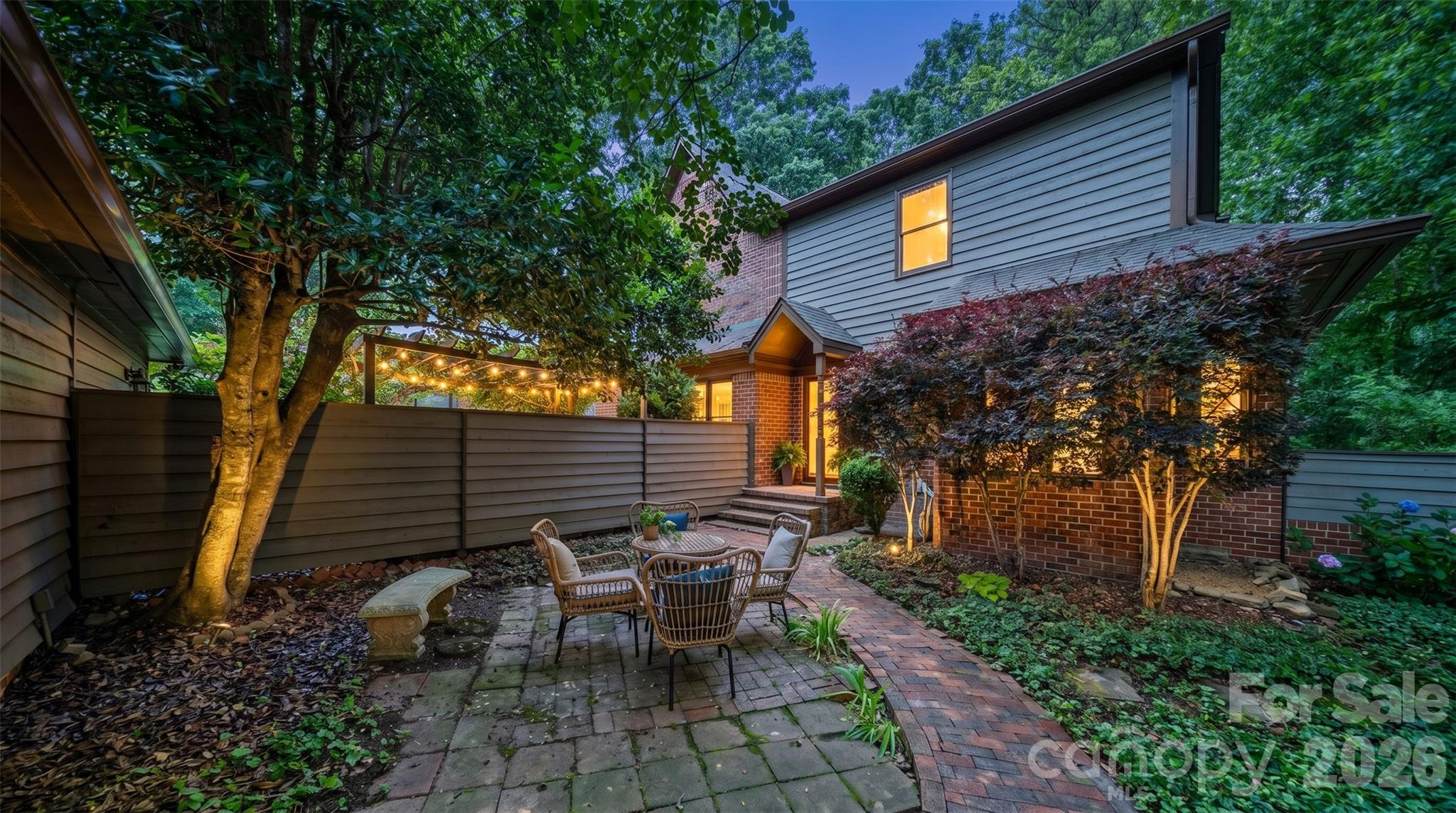Wake up to the gentle rustle of trees and enjoy the feeling of a private retreat in the heart of Charlotte. Nestled in sought-after South Charlotte, this meticulously maintained town-home offers the perfect blend of comfort, convenience, and timeless mid-century-inspired charm. Just minutes from SouthPark, Uptown Charlotte, and Matthews, you'll enjoy easy access to premier shopping, dining, and entertainment while being surrounded by nature.

Step outside and connect directly to the scenic McAlpine Creek Greenway, where miles of peaceful trails create a serene backdrop to everyday living. 

Inside, abundant natural light fills the home, creating a warm and inviting atmosphere throughout. The thoughtfully designed floor plan features two spacious bedroom suites, each with its own private bath, plus an additional half bath for guests. The stylish kitchen showcases granite countertops. Sewer and water are included in the HOA fees.

The cozy living room centers around a fireplace, providing the perfect space to relax, gather with friends, or enjoy a movie night. Recent upgrades include Trex decking, upstairs and downstairs, and recessed dimmable lighting, adding both style and functionality.

A charming front courtyard and detached two-car garage complete the property, offering exceptional outdoor living and convenience. With direct greenway access and an unbeatable location close to South Charlotte's best destinations, this home delivers a rare combination of tranquility, character, and accessibility.