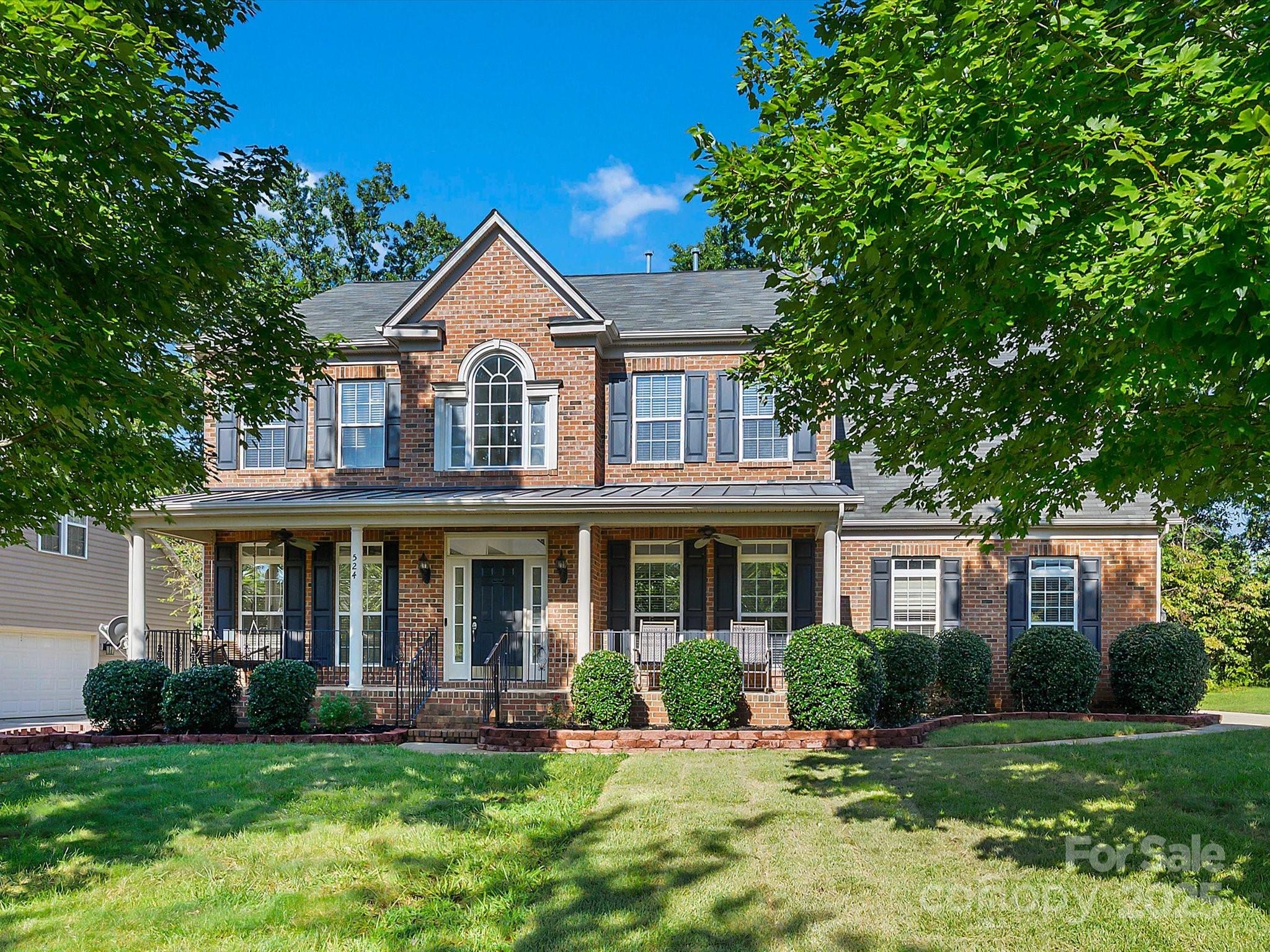Gorgeous Ryan Homes Signature Collection residence in the sought-after Fallbrook community, just steps from Anne Springs Close Greenway—perfect for trails, nature, and outdoor activities! Zoned for top-rated Fort Mill schools, this home blends elegance and convenience with nearby parks, shopping, and dining. A welcoming rocking-chair front porch opens to a dramatic 2-story foyer, formal living & dining rooms, and a private study with French doors. The great room features a gas fireplace, coffered ceiling, and custom built-ins, flowing into a chef’s kitchen with large island and bright sunroom. Upstairs, the luxurious primary suite offers a spa bath with Jacuzzi tub and dual walk-in closets, plus three additional bedrooms. Enjoy fresh paint, epoxy-finished garage floors, EV charger outlet, and a spacious backyard deck—ideal for entertaining and relaxation. Built on a crawl space with a 3-car garage and wide driveway, this home combines comfort, updates, and lifestyle appeal!