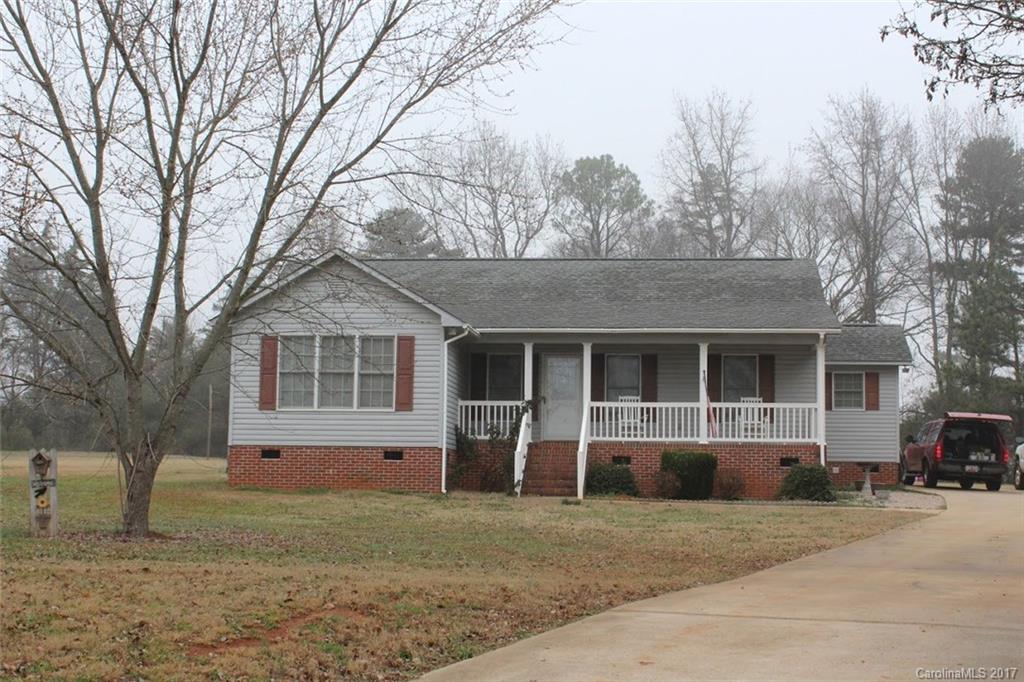 Adorable home in a quiet country setting featuring a large yard with deck in a cul-de-sac!  Home boasts three bedrooms and two full baths with a gas fireplace and vaulted ceiling in the living room.  Conveniently located near downtown York, Lake Wylie, Rock Hill, Gastonia and Charlotte!