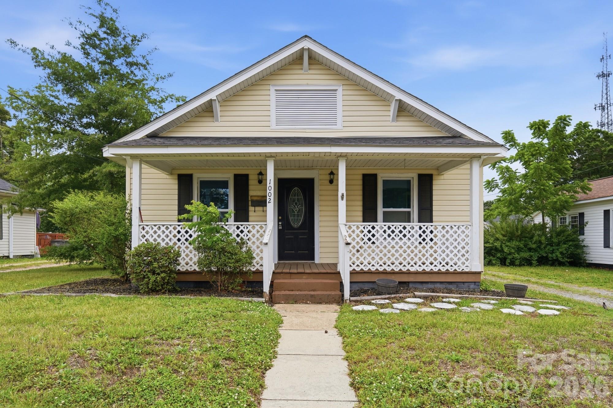 Charming and move-in ready 3-bedroom, 2-bath home conveniently located just 1 mile from vibrant Downtown Kannapolis! This inviting property blends classic character with everyday functionality, featuring a spacious living area with a cozy fireplace, updated flooring throughout, and a practical main-level laundry room. The kitchen offers ample cabinet space along with included appliances, making it perfect for daily living or entertaining guests.

Step outside to enjoy the covered front porch and fully fenced backyard complete with a storage shed, offering plenty of space for pets, outdoor gatherings, gardening, or additional storage needs. Situated on a level lot with easy access to shopping, dining, parks, and all the exciting growth happening throughout Kannapolis, this home offers both comfort and convenience in a rapidly growing area.

Whether you're a first-time homebuyer, downsizing, or looking for an investment opportunity, this property is one you won’t want to miss!