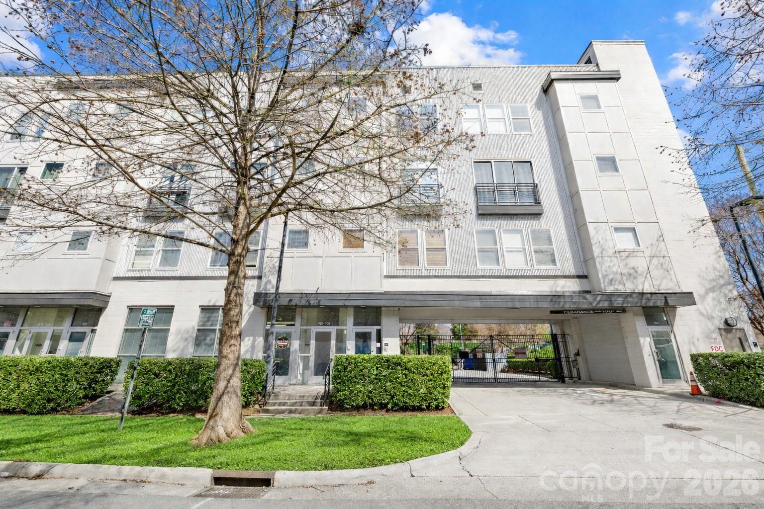 Welcome home to 918 Westmere! A modern three-story condo in Charlotte’s rapidly transforming Third Ward, just steps from the highly anticipated Iron District redevelopment, bringing new restaurants, retail, offices, and entertainment to the neighborhood. Inside you’ll find engineered hardwood floors, stainless steel appliances, abundant natural light, and a striking spiral staircase connecting you to the rooftop. Convenient laundry access located within a closet in your primary suite. The private rooftop terrace offers a rare outdoor retreat in the city—perfect for entertaining or relaxing while enjoying skyline and stadium-area views. Additional highlights include a private keyed entrance and gated parking for added convenience and security. Located within walking distance to Bank of America Stadium, Truist Field, Irwin Creek Greenway, Uptown, and South End, this condo offers incredible access to Charlotte’s best dining, entertainment, and outdoor spaces. A rare opportunity to own in one of the city’s fastest-growing areas!