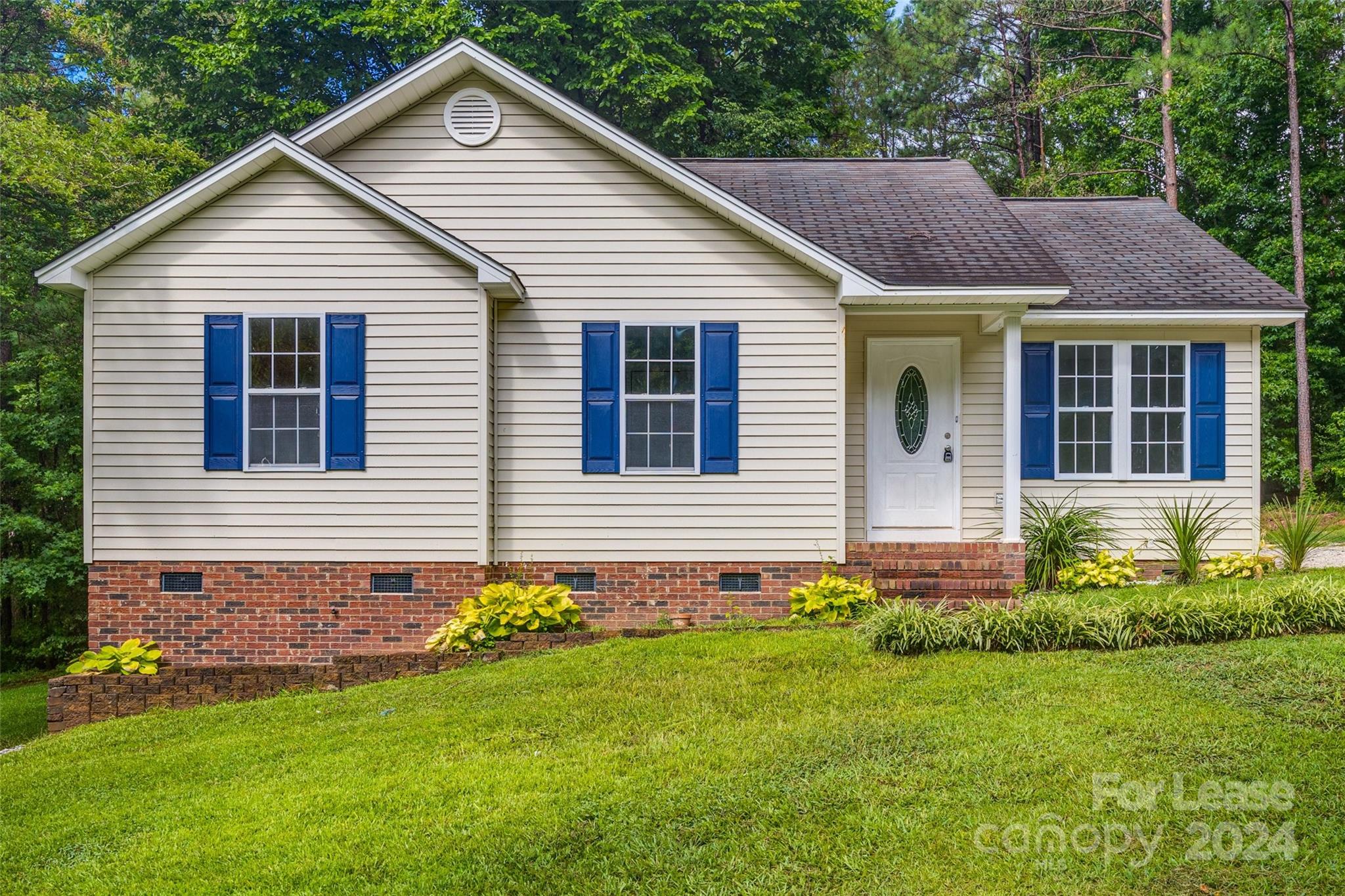 3 BR, 2 BA Country Cottage home. Durable floors throughout, a spacious kitchen that opens to a back porch, and a large backyard. 2 Refrigerators, washer and dryer hookups.