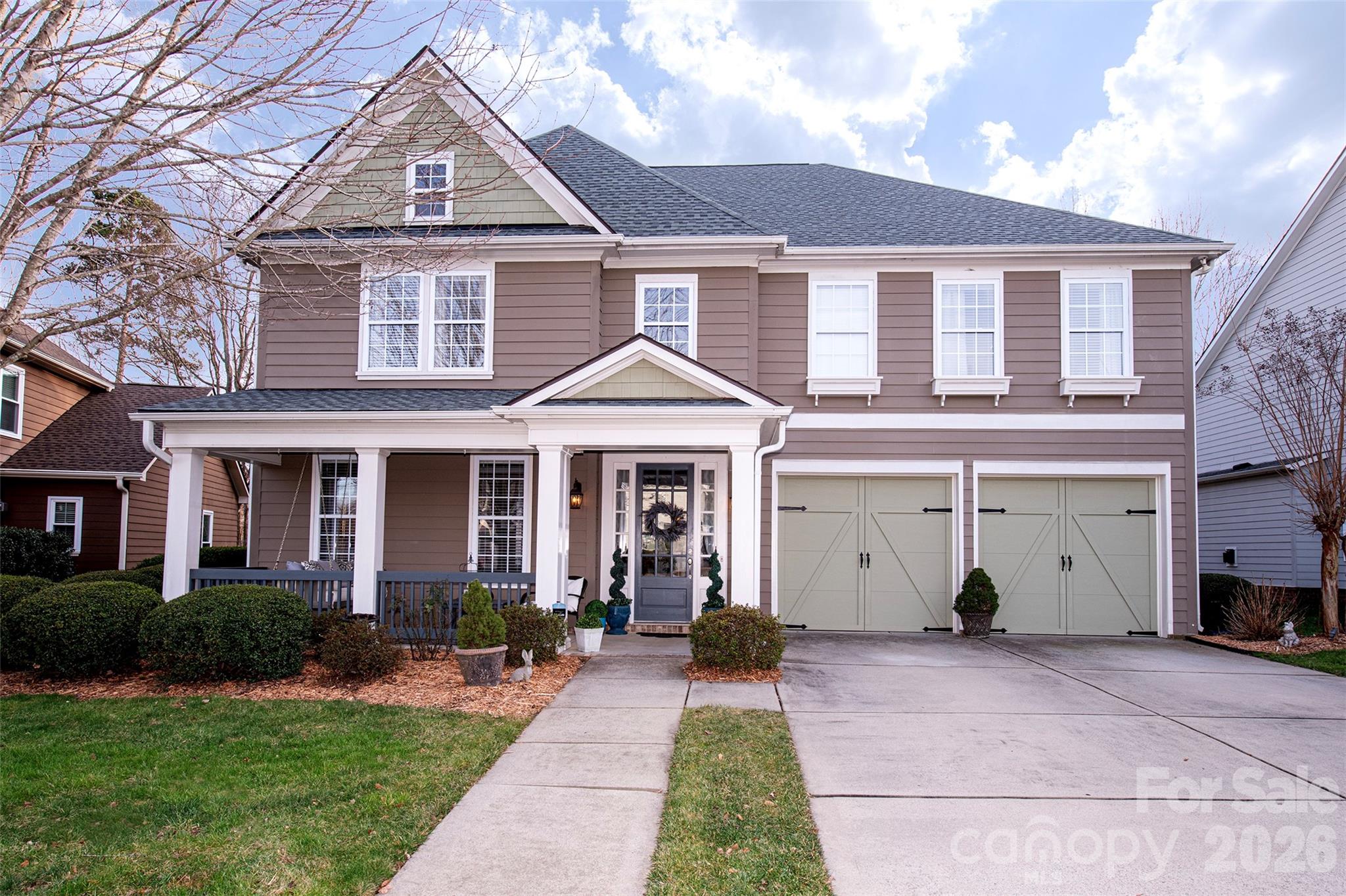 Welcome Home! This 4-bedroom, 3.5-bathroom house with a 2-car garage offers luxurious living and entertainment spaces. It boasts a gourmet kitchen with an oversized island, stainless steel appliances, a walk-in pantry, and plenty of cabinet space. The inviting great room features a cozy fireplace and entertainment setup, perfect for relaxing evenings. If that’s not enough, you can step outside to your screened porch. Upstairs, the primary suite is a true retreat with its en-suite bath featuring dual vanities, a soaking tub, separate shower, and walk-in closet. Three additional bedrooms offer ample space, along with an upstairs loft/play area and a convenient upper-level laundry room. All of this in the highly sought-after Bridgemill community, which offers a grand clubhouse for events, 2 pools (one aquatic park-style), a state-of-the-art fitness center, multiple tennis courts with pickleball options, a dog park, multiple pocket parks, walking trails, and more. Located in the top-rated Indian Land School district with easy access to shopping, dining, and commuting to Charlotte.