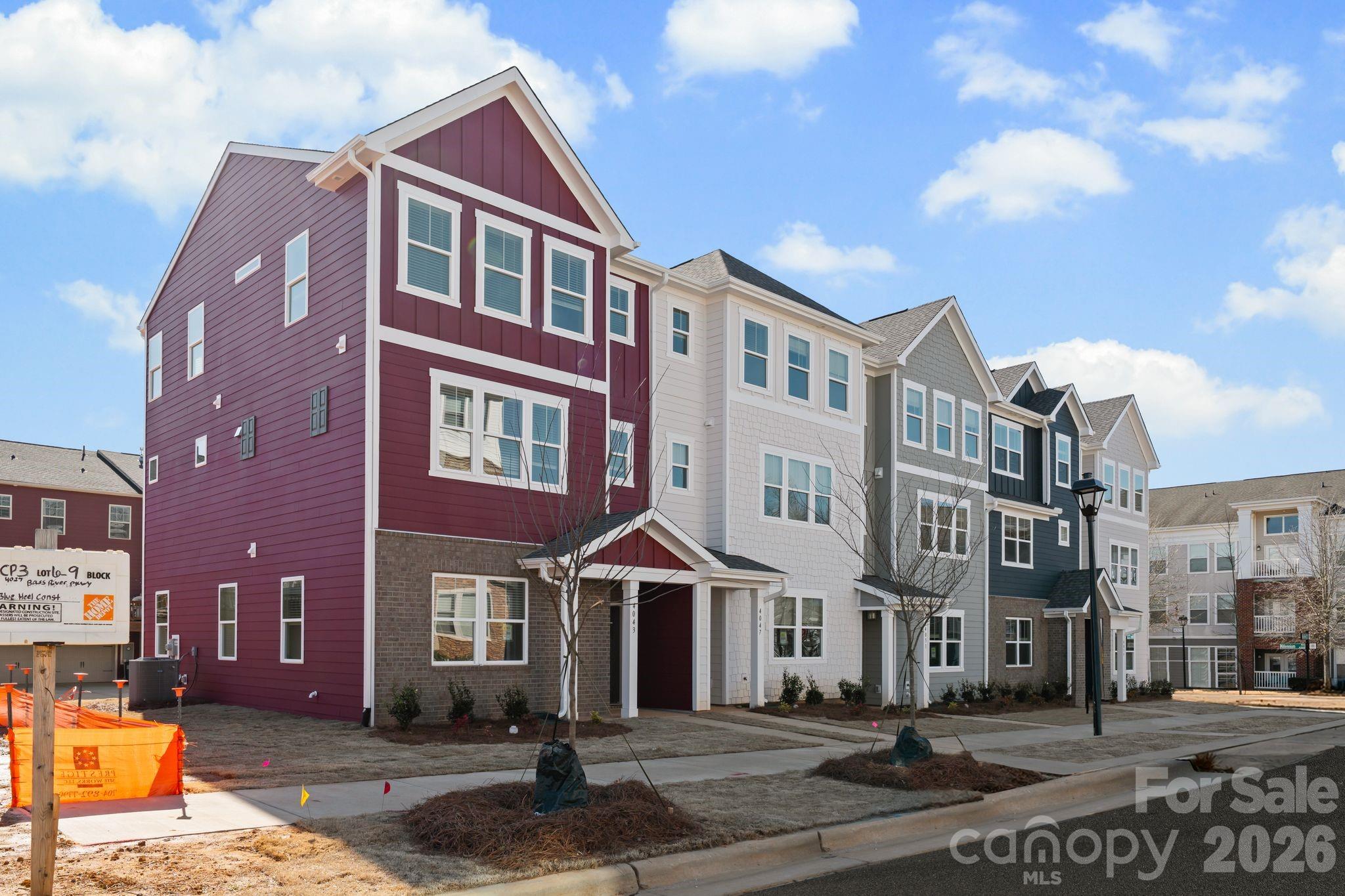 NEW CONSTRUCTION MOVE IN READY! Discover upscale living in this modern three-story townhome in desired City Park Neighborhood! Featuring a flex space office/study on the main floor, as well as, three bedrooms and two full baths on the third floor with a half bath on the second. The open-concept second floor showcases a chef-inspired kitchen with stainless steel appliances, quartz countertops, tile backsplash and designer lighting. The primary suite offers plush carpeting, a walk-in closet, and a double vanity en-suite showcasing a floor to ceiling tiled shower. Enjoy a generous rear deck, perfect for entertaining, and the convenience of a private two-car garage. An unbeatable location a few miles from Southend and Uptown Charlotte, as well as, walkable to attractions such as Charlotte Regional Farmers Market, Starbucks, Chipotle, Panera and more! Schedule your showing today!