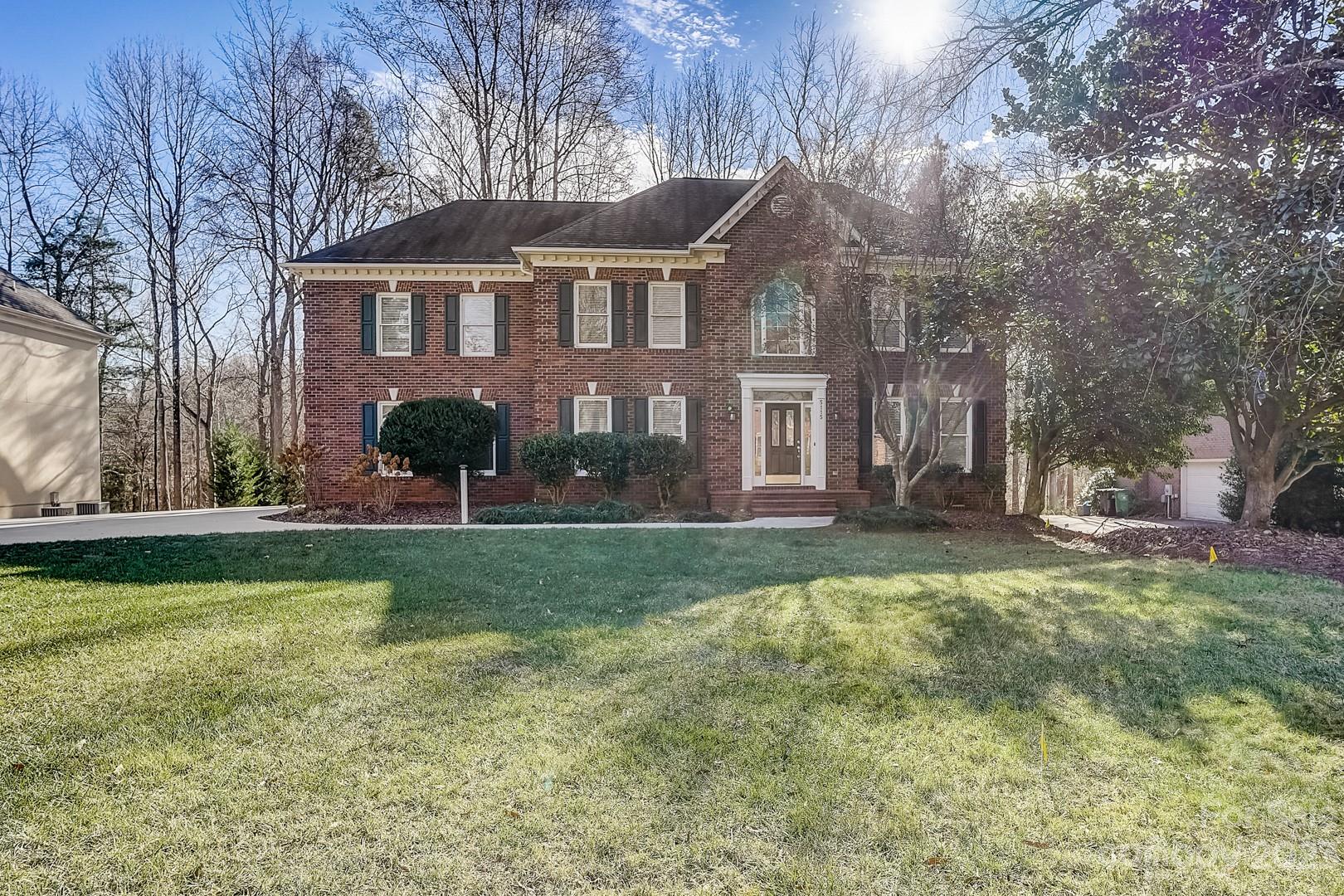 Back on the Market after doing a few updates.... Come take a look at this GORGEOUS all brick colonial style home surrounded by mature trees in a well established neighborhood.  
With a little work, this home could be a dream home!  It features a great floorplan with tons of storage options in every room.  Large windows that let in a ton of natural light, tall ceilings that make the rooms feel massive and extensive moldings.  The large eat-in kitchen features an island and a breakfast nook with bay windows that overlook the HUGE back deck.  Each bedroom has large closets and are very spacious.