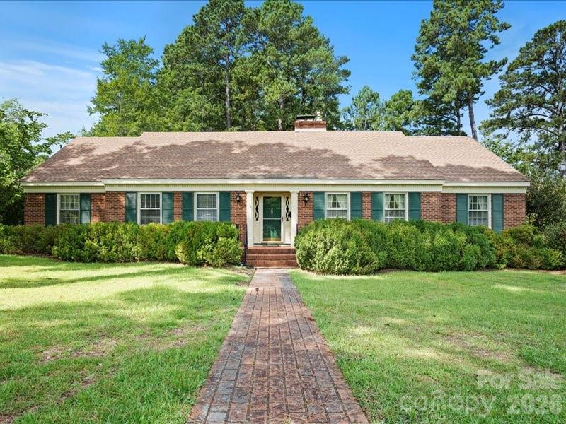 BACK and IMPROVED!!! Second chance opportunities are rare - especially one like this, so don't miss out! With close to3000 square feet, these 4 BR/3B homes is ready from the ground up! Adding both comfort and value, NEW updates include: the incapsulated crawl space, beautiful carpet on the stairs and upstairs, freshly painted interior, and a central heat/air system installed for the second story. Located in a quiet, established neighborhood close to shopping, schools, and Arrowhead Park, 201 Poplar boasts great space both inside and out. In addition to traditional formal and informal living and dining space, 3 BR, and 2 full bathrooms downstairs, there is also a fourth bedroom, full bathroom, and a huge bonus room upstairs that could suit many needs. With a tremendous amount of walk-in attic space, a walk-in primary closet, and a separate laundry room with pantry, storage space is not an issue here! The eat-in kitchen has solid surface counters and is a welcoming place itself. Outside, you'll find a new, back deck, a nice garden shed, and a huge, one-car garage/workshop with concrete floor and electric. Make an appointment to see this one today!
