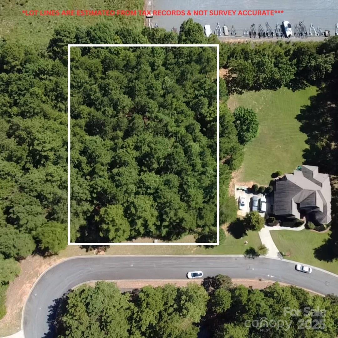 Imagine your dream home on this private cul-de-sac homesite at 3124 Ashwood Park Drive, set within the prestigious gated community of Reflection Pointe on Lake Wylie. Choose your own custom builder or collaborate with the community’s trusted partners to bring your vision to life. Here you’ll enjoy exclusive amenities: a private sandy beach, marina with boat storage, tennis courts, clubhouse, and scenic walking trails—all just minutes from vibrant downtown Belmont and a short drive to Charlotte. This is more than a lot—it’s the gateway to your best lake life. Claim your piece of Belmont’s thriving future today.