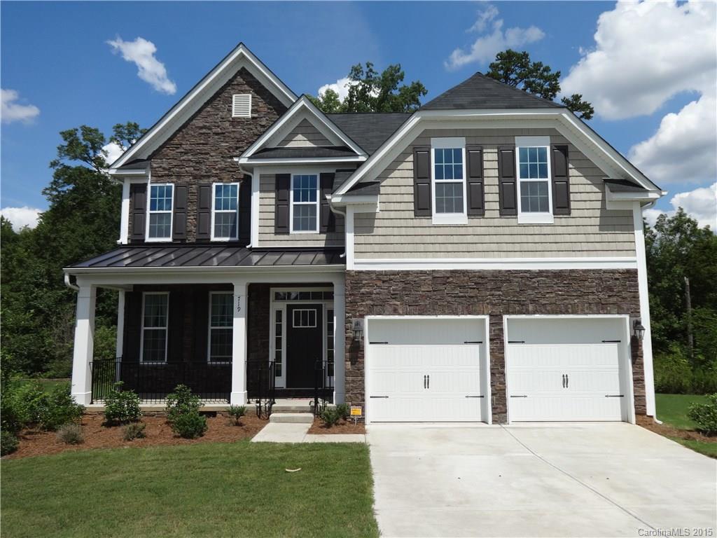Almost new 4 bedroom 3 bath home built just 2 years ago with attached 2 car garage.  Features include beautiful stone and vinyl exterior, front porch, 1 bedroom with full bathroom on main level, coffered ceiling in dining room, granite counter tops & stainless appliances in kitchen, eat-in bar counter, gas logs fireplace in great room, multifunctional bonus room or 5th bedroom, convenient 2nd floor laundry, extensive hardwood floors on main level, across the street from neighborhood playground.