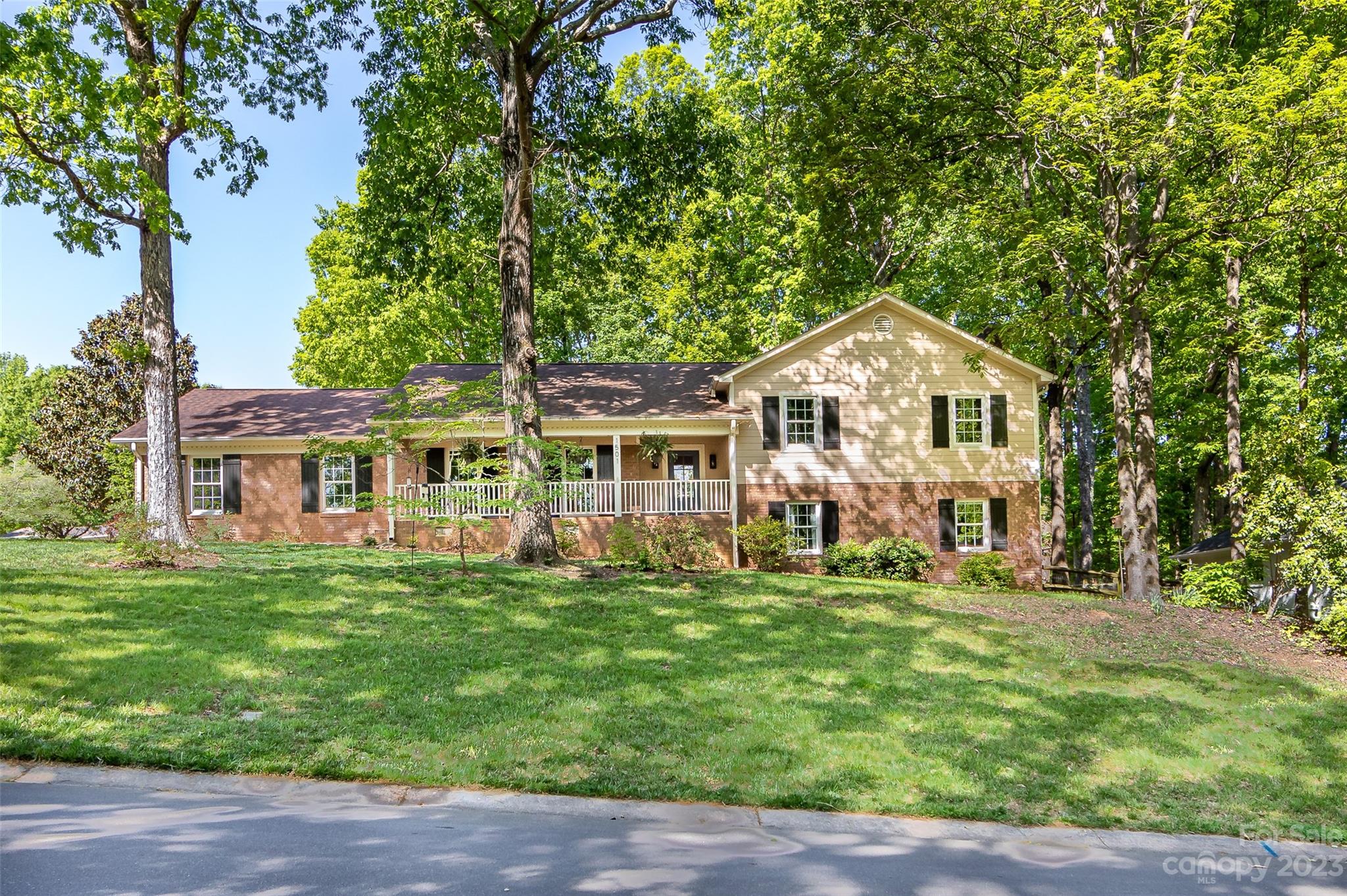 Price improvement in Stonehaven! This home was lovingly updated in 2021 and offers almost 2700 sf of living space, with an additional 735 sf of garage. The main level is well appointed with an open kitchen surrounded by living room and dining area. Light floods into this space from the back sunroom, with updated cork flooring. The kitchen is a chef's dream with a Kucht 6 burner gas range and Thor range hood. The hardwood floors continue upstairs to the primary ensuite and two additional bedrooms with a full bath off the hall. Downstairs, there is a fourth bedroom, full bath and large den complete with wet bar and cozy wood burning fireplace. Head out the sliding glass door and take in the enclosed private patio. Backyard includes rainwater garden and the property is certified wildlife habitat. Look out for deer, as they love to run through! Stonehaven has two membership swim clubs. Greenway access is nearby as well. Great neighborhood, convenient to Cotswold, South Park and schools.