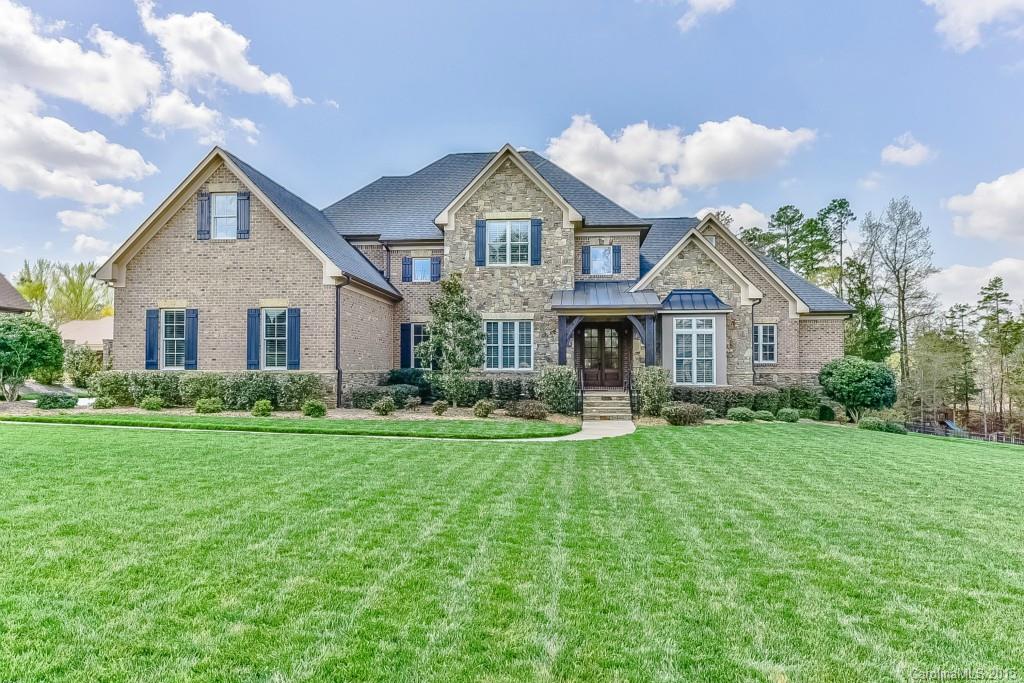 Stunning Full Brick/Stone Custom pristine move in ready Home. Huge Kitchen w Keeping Rm & Stone Fireplace w Cathedral Ceiling. Granite Tops throughout, Upgraded Appls, Breakfast area. Upgraded Molding everywhere. Beautiful Hardwoods 1st Floor. Elegant Living Rm w Coffered ceilings. Formal Dining Rm w Trey & Molding. Perfect Master Wing, w/ Sitting Rm, His & Her Custom Walk In Closets.  Bath w Vaulted Ceiling & Granite. Custom Mirrors throughout. Media Rm w/ Projector & Screen. Low SC Taxes