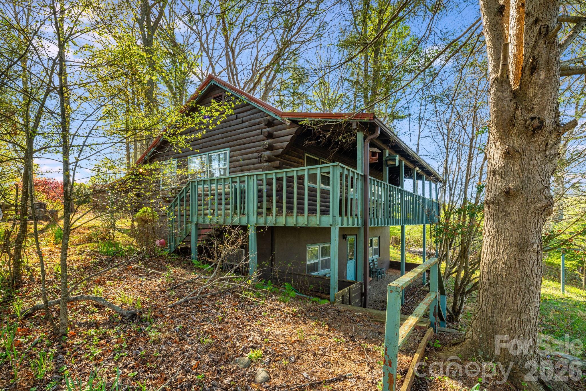 Tucked away in the mountains of Yancey County, this 2-bedroom, 2-bath log cabin offers the kind of setting people dream about—peaceful, private, and surrounded by nature with a beautiful mountain view. With its classic log construction, vaulted ceilings, and stone fireplace, the home is full of character and ready to be brought back to life.

The property does need work, making it a great opportunity for investors, second-home buyers, or anyone looking to restore a true mountain cabin to its original charm. The spacious deck provides the perfect spot to take in the views, while the lower level offers additional potential for expansion or guest space.

Whether you’re looking for a renovation project, a weekend getaway, or a long-term investment, this property has strong upside in a highly desirable mountain location.

Bring your vision and make this cabin shine again.