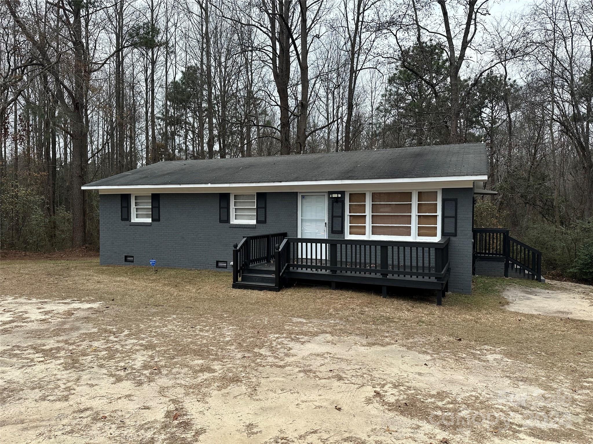 Make this move in ready house your home, located just outside the city limits of Pageland on a 1 acre lot!  It features 4 bedrooms, 1.5 baths, living room and kitchen.  Enjoy sitting on the spacious front deck.