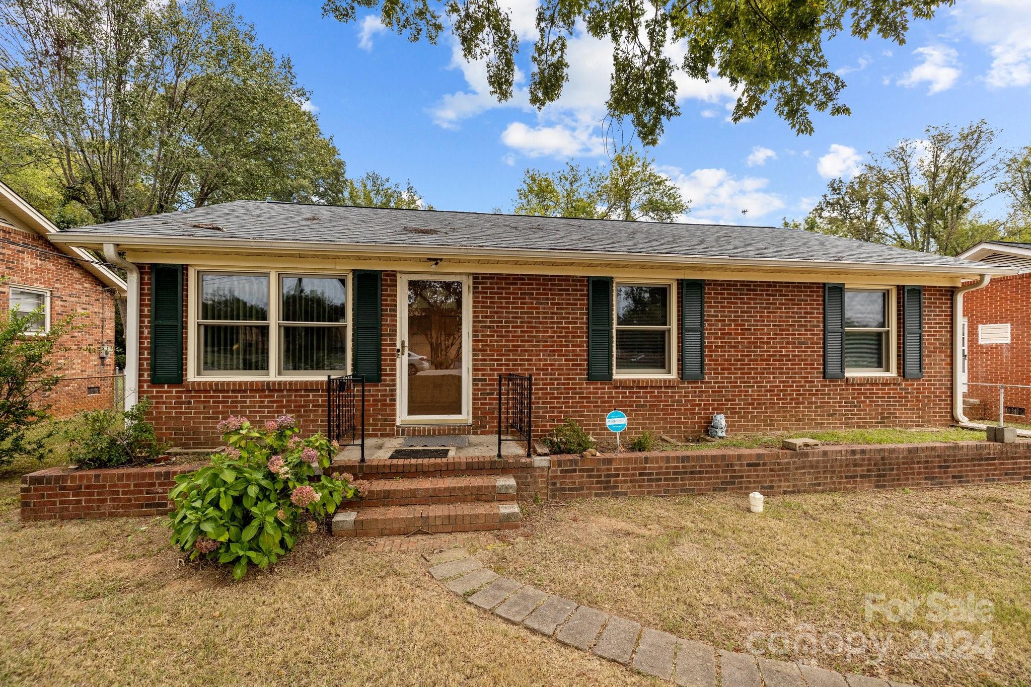 Charming 3-bedroom, 1-bath home that has been lovingly maintained and is ready for your personal touch! Featuring a spacious family room, separate living room, and a large backyard with a storage building. Pretty Hardwoods underneath carpet! Located directly across from an elementary school, the home also boasts a newer roof! Ideal for families or investors looking for a solid property with great potential!