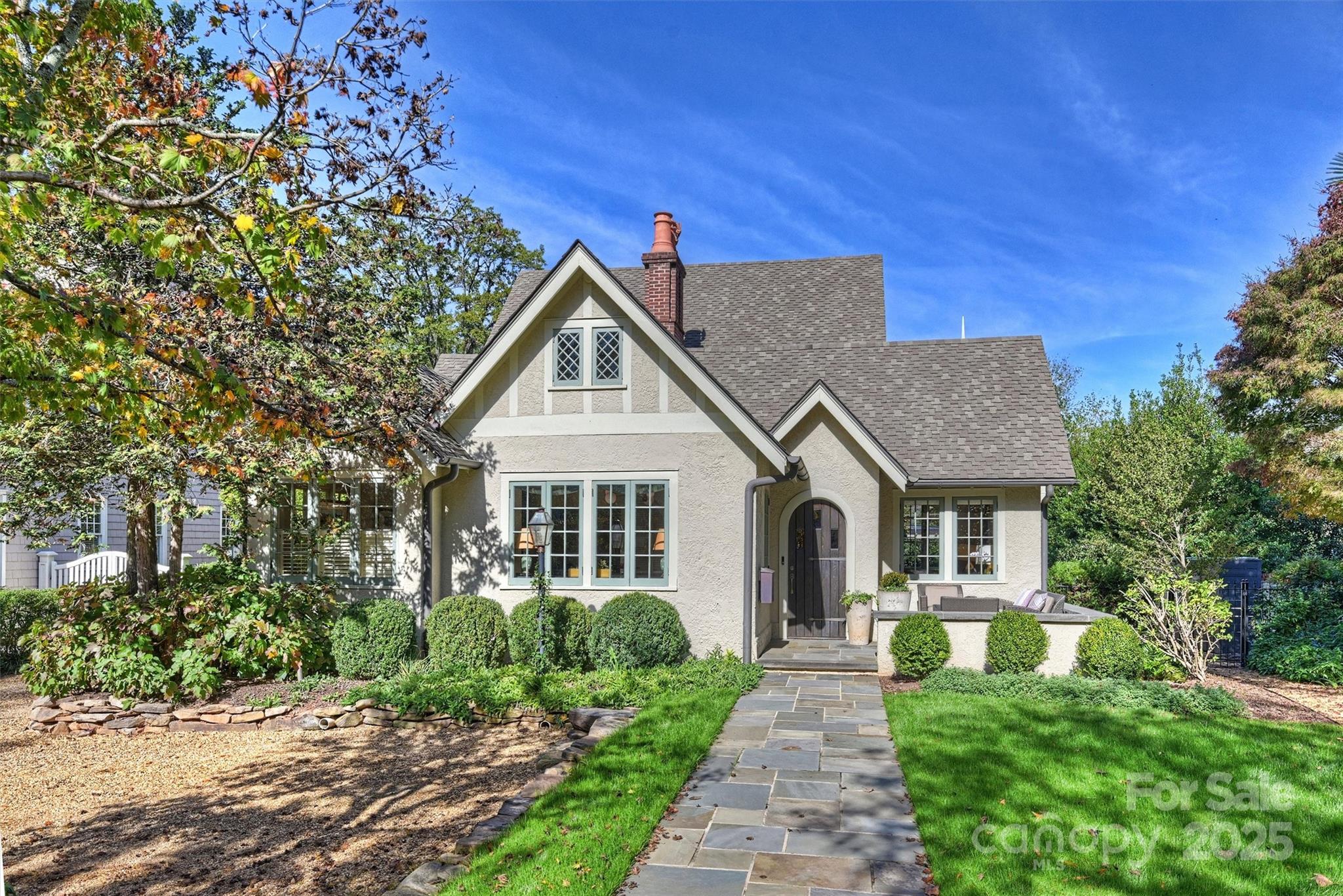 Charming Myers Park cottage on great street.  Built in 1924 but with all the modern amenities.  Bright open floor plan perfect for entertaining.  Large living / great room with dining area over looking private backyard, terrace and salt water pool with hot tub.  Covered patio with outdoor fireplace with gas starter.  Kitchen has been updated with new cabinets, counter tops, Subzero refrigerator and freezer stacks.  Wolf gas range with double ovens.  Walk in pantry.  Laundry room / drop zone.  Primary Bedroom and updated bath on main with two large walk in closets.  Den or Office with built in cabinets.  Two large bedrooms up with walk in closets, dressing room and updated bath.  Two car garage has tons of storage.  Fourth bedroom / Guest house over the garage with full bath.  Basement is unfinished but used a lot for storage.  Yard has turf around pool and in ground irrigation.  Unique home with year around inside / outside living!  First showings Tuesday Jan 14th.