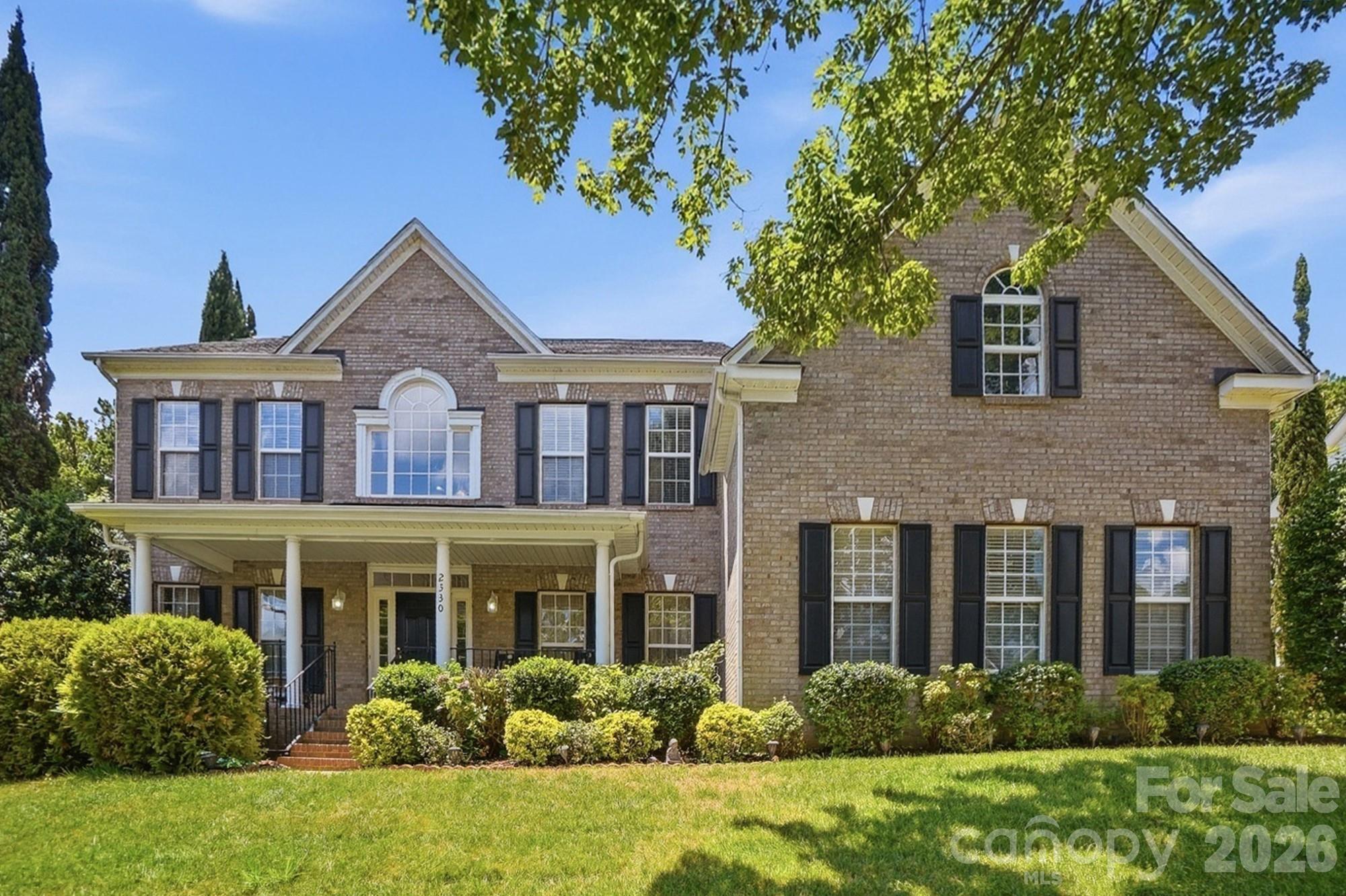 Welcome home to one of Fort Mill's most sought-after communities where award-winning schools, vibrant neighborhood life, and an unbeatable location come together in one exceptional package.  Step inside and be greeted by a dramatic two-story foyer that sets the tone for the open, airy living spaces throughout. The main floor is thoughtfully designed for real life a true open-concept layout keeps everyone connected whether you're prepping in the kitchen or relaxing in the soaring two-story family room. Hosting is effortless with a convenient half bath for guests, and the added bonus of a private bedroom and full bathroom on the main level offers ideal flexibility for multigenerational living or visiting guests.  Upstairs, escape to a generous primary suite complete with a beautiful ensuite featuring a like-new corner jacuzzi tub the perfect place to unwind after a long day. Three additional nicely sized secondary bedrooms and a full bath round out the upper level, offering plenty of room for everyone.  Outside your front door, the community delivers a true resort lifestyle: splash away at the resort-style pool, let the kids play at the playground, and take advantage of a full calendar of neighborhood events from food truck nights and a springtime egg hunt to the beloved back-to-school ice cream social, Halloween parade, and movies by the pool. This is the kind of neighborhood where neighbors become friends.  The location is simply unmatched. Just minutes from downtown Fort Mill's restaurants, the local library, and scenic Greenway trails, with easy access to the Lake Wylie boat ramp for weekend adventures on the water. Commuters will love being only 20 minutes from Uptown Charlotte and Charlotte Douglas International Airport. Add in the benefit of low South Carolina property taxes and attendance in Fort Mill's award-winning school district, and this home truly checks every box.  Come see why Fort Mill is one of the Carolinas' most desirable places to call home and make this incredible property yours!