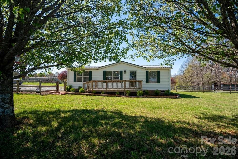 BOM DUE TO NO FAULT OF THE SELLER.  Imagine waking up to panoramic views in the peaceful rolling hills of Olin.  Situated on a 1.4 acre lot,  this 3 bedroom, 2 bathroom home offers the perfect blend of rural freedom and convenience located only about 15 minutes to downtown Statesville and 5 miles from I-77 making a Charlotte or Winston-Salem commute very manageable. Remodeled just 2 years ago, this home is impeccably clean, freshly painted and features a great floorplan.  Extra  features include a fenced in front yard, storage shed, plenty of parking for RVs, boats or guests and a home warranty.  Whether you are looking for a private retreat or an investment opportunity, 889 Tabor Rd is a must-see!