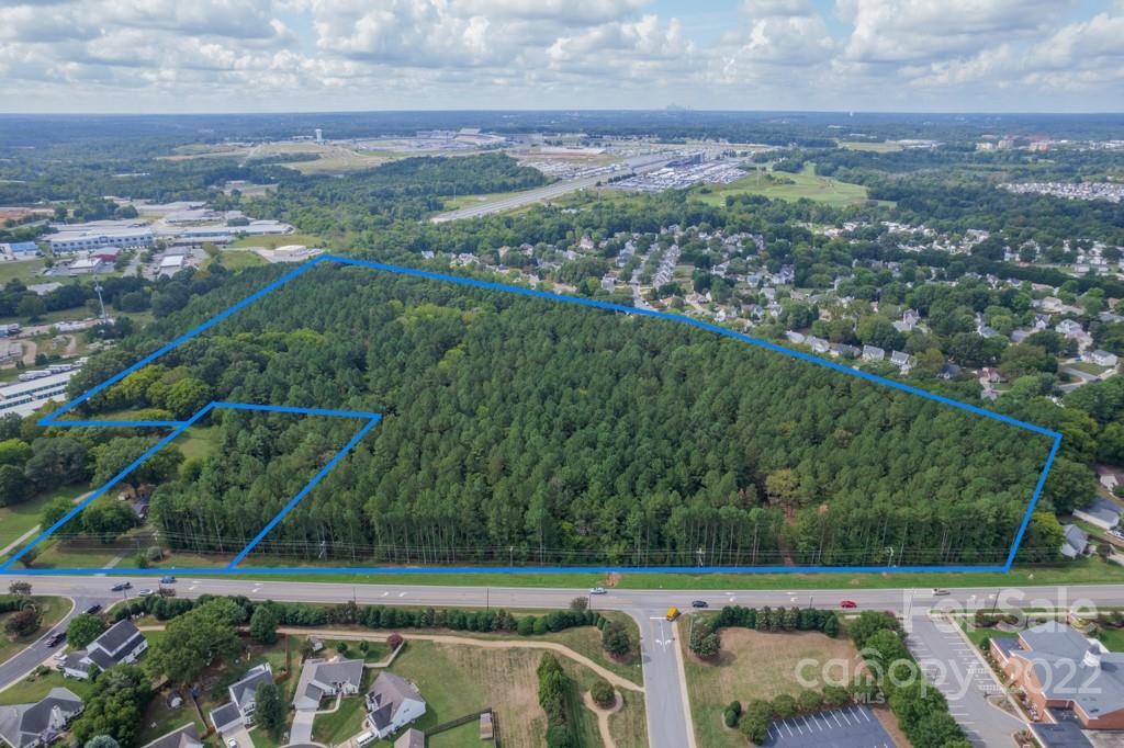 Nice tract of land with great frontage ready for development. Less than 1/2 mile from Highway 29 and 4.25 miles from Concord Mills and I-85.  Currently zoned RM-2 and I-1 with Concord's future plan calling for a MUAC (Mixed Use Activity Center - see attachments for details.)