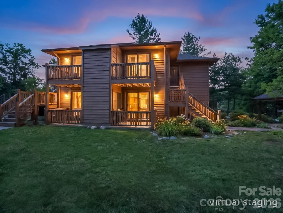 Welcome to this beautifully updated and move-in ready condo offering modern finishes and worry-free living just minutes from downtown Hendersonville. This condo has been extensively renovated with new kitchen cabinets, countertops, sink, faucet, microwave and dishwasher, along with new windows and a sliding glass door that bring in abundant natural light. The bathroom features a new vanity, mirror and toilet, and the home includes a new stackable washer and dryer for convenience. Additional upgrades include new interior and exterior doors & hardware, fresh interior paint, new LVT flooring throughout, and updated lighting fixtures, creating a clean, contemporary feel. Major improvements extend beyond the interior, with a brand-new roof (2025), a completely renovated and encapsulated crawl space, and a freshly painted/stained exterior offering peace of mind for years to come. This building is currently under single-ownership, meaning the buyer will be the HOA's first outside member. The seller states there are no legacy issues and reports that the HOA is well-positioned financially, citing more than $50K in recent capital improvements. Simply move in and immediately enjoy downtown shopping, multiple nearby restaurants and the Ecusta Trail, all within 1 mile. Unit 4 (lower level) also available, MLS 4328393. Unit 4 and Unit 8 also being sold together (MLS 4350760).