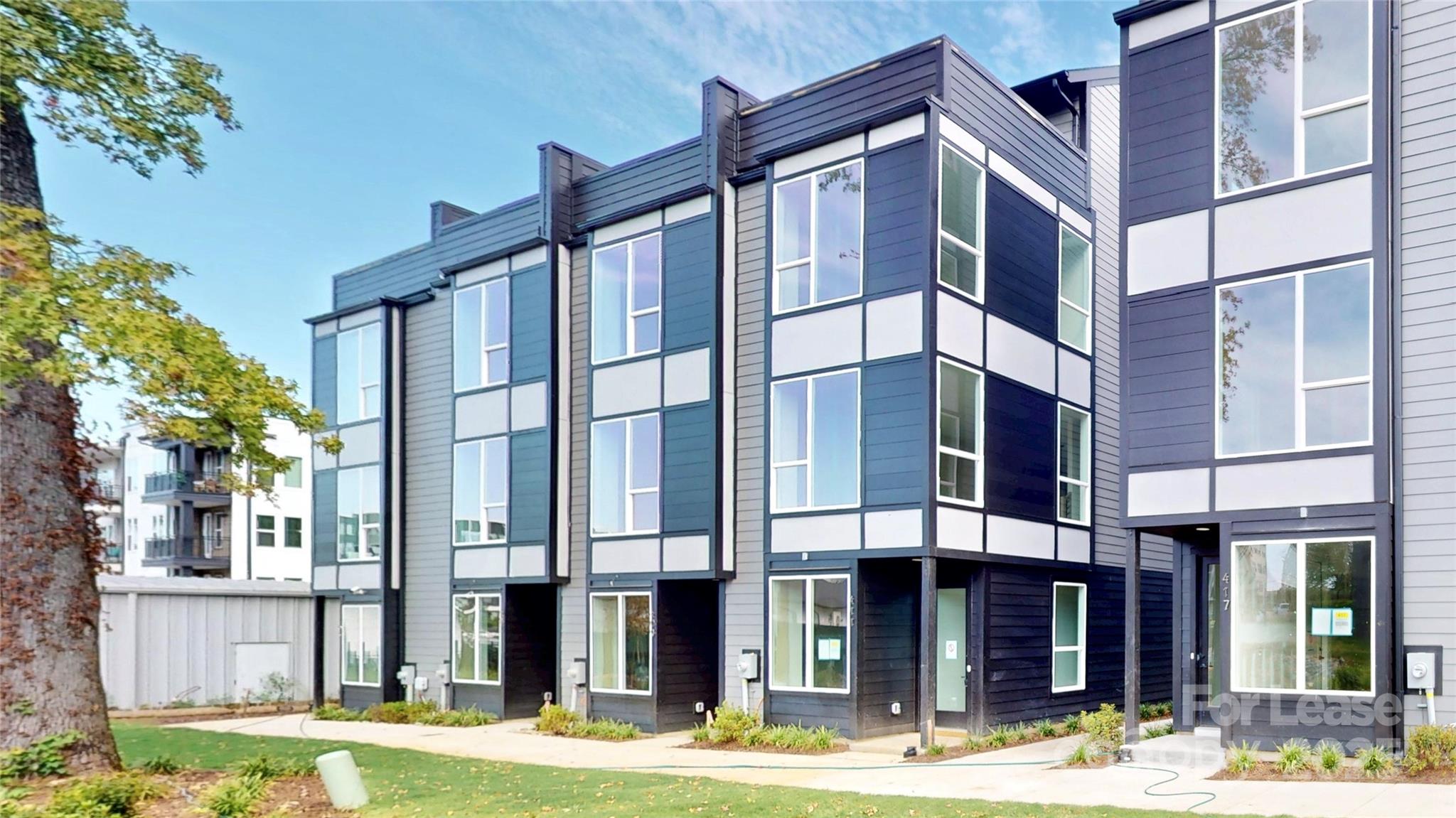 New construction rental in the heart of LoSo! This modern 3-bedroom, 3.5-bath home features an open floorplan with oversized windows that fill the space with natural light. The kitchen offers high-end finishes, plenty of storage, and an oversized island that’s perfect for entertaining. Upstairs, you’ll find a spacious rooftop balcony with room for an outdoor TV. Each bedroom includes its own en suite bathroom. Washer and dryer are provided. Parking is easy with a 2-car tandem garage plus guest street parking. Rally, Sugar Creek Brewing, Olde Meck and more of LoSo’s breweries, restaurants, and entertainment are just steps from your door.