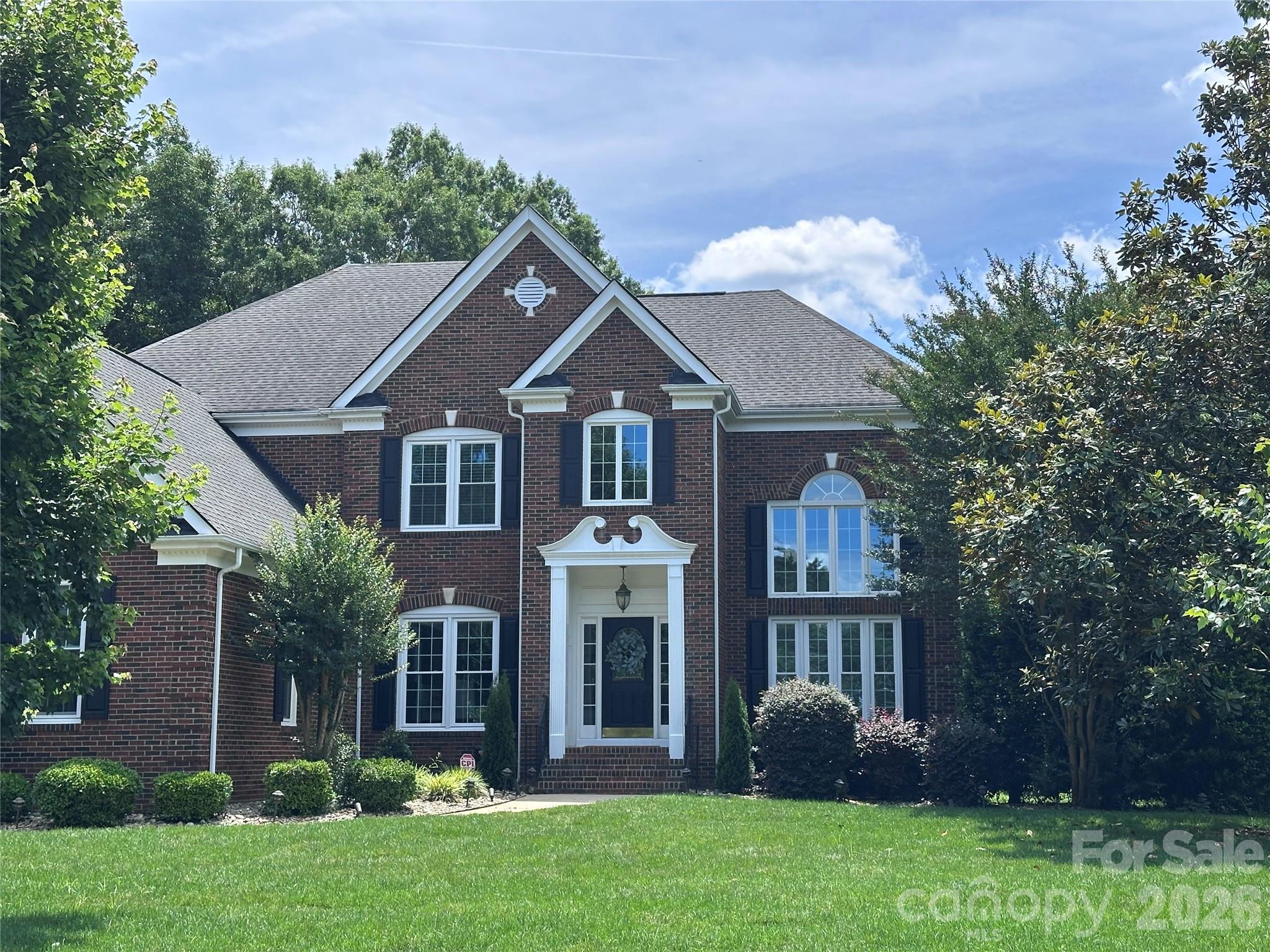 Exceptional opportunity in the highly desirable Marvin school district! Situated on a private 0.62 acre cul-de-sac lot in sought after Canterfield Creek, this spacious residence offers five bedrooms and four full baths with a thoughtfully designed layout ideal for both everyday living and entertaining.  
A soaring two story entry welcomes you into a light filled living room, setting the tone for the home's open and inviting feel.  The main level features an updated kitchen complete with a walk in pantry, center island and gas cooktop.  A wet bar/coffee station nook flows seamlessly into the formal dining room.  The generous gathering room, highlighted by custom built in bookshelves opens directly to the kitchen, creating the perfect hub for connection.  Also on the main level, you'll find a dedicated home office and a private guest suite with a full en-suite bath.  Laundry room with sink is on the main level as well. Dual staircases lead to the upper level, where the expansive primary suite offers a luxurious retreat with an updated bath featuring a soaking tub, dual vanities and two custom walk in closets.  Three additional bedrooms, two full hall baths, and a versatile bonus room with attic storage complete the second floor. 
Enjoy peaceful outdoor living from the beautiful screened porch just off the kitchen-an ideal spot to relax and unwind.
Sellers replaced upstairs furnace and AC unit in 2021.  All windows in this home were replaced less than 5 years ago.  All window shades and blinds also replaced at the time.  Conveniently located just minutes from shopping, dining and everyday conveniences, and only 18 miles from Uptown Charlotte, this home combines suburban tranquility with easy access to the city.  Top rated award winning schools complete the package!