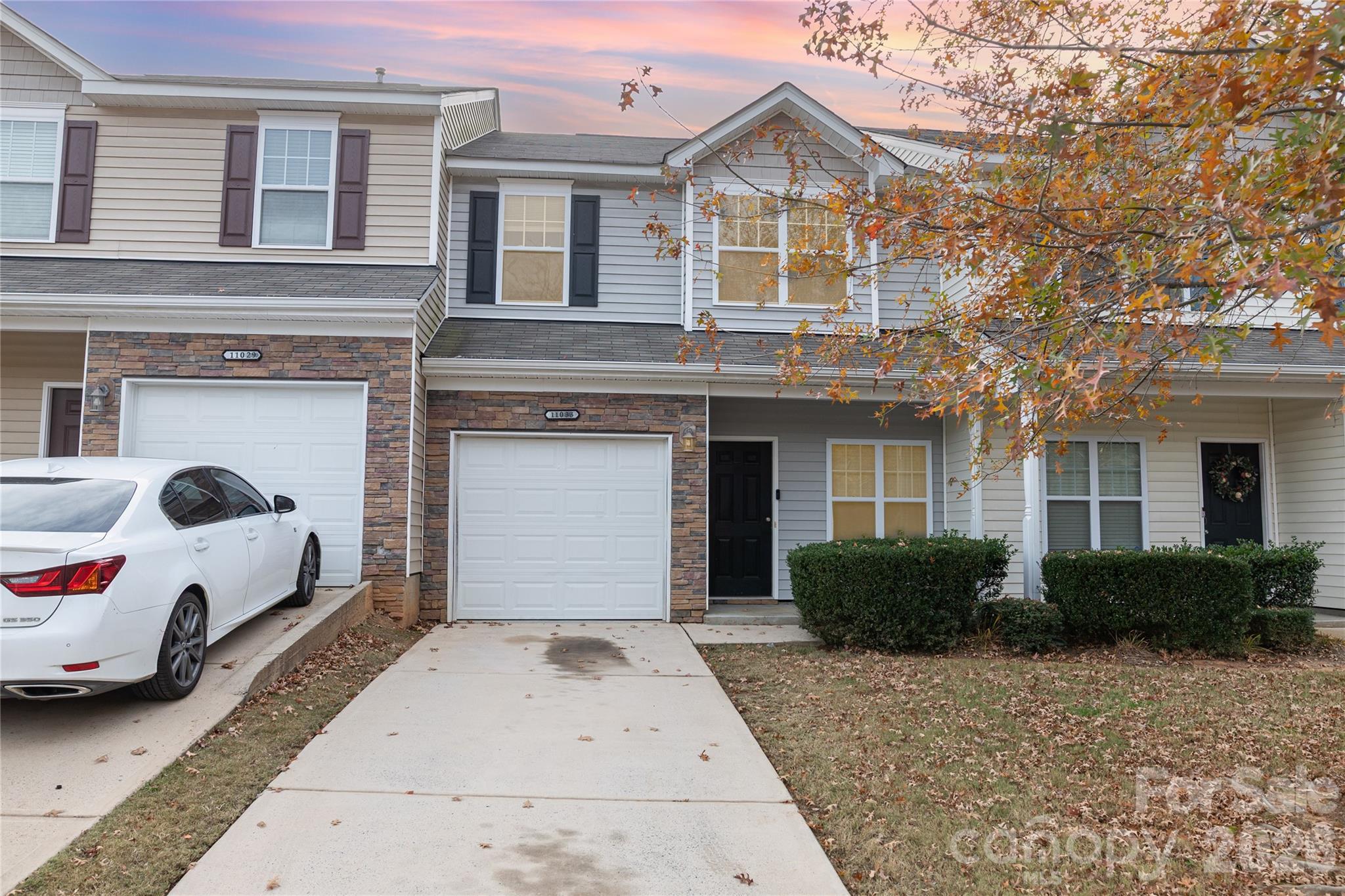 Welcome home to this beautifully updated, turn-key townhome in the highly desirable Villages at Back Creek community! Perfect as a primary homeowner’s oasis or an investor’s dream addition to their portfolio, this 2-story property offers the perfect blend of modern comfort and unbeatable convenience.  Step inside to find a light-filled main level featuring fresh neutral paint and a spacious, open kitchen. The kitchen comes fully equipped with granite countertops, sleek stainless steel appliances, and a brand-new dishwasher. Just off the kitchen, the patio door opens up to a private, fully fenced-in backyard—ideal for relaxing, entertaining, or letting pets play.  Upstairs houses the peaceful primary suite complete with an en-suite bathroom and walk-in closet, alongside two additional guest bedrooms and a second full hallway bath.  Location is unmatched! Situated just 5 minutes from everything University City has to offer including corporate offices, extensive shopping, local dining, and UNC Charlotte. With immediate access to I-485, your commute around the greater Charlotte metro is a breeze. Move right in and enjoy community amenities like the outdoor pool! Schedule your showing today.