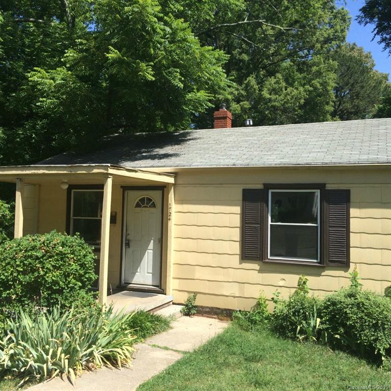 Great opportunity, fixer-upper in HOT Wilmore. Walk to uptown, the stadium, light rail and shopping / dining / nightlife in Southend. Hot needs work and is priced accordingly, to be an "as is" sale. Deep lot that falls to the back, could be perfect for basement home. ****multiple offers received - calling or highest and best by 2pm today****