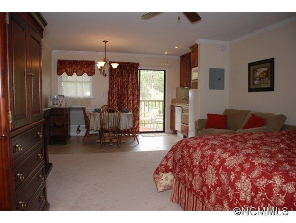 This beautifully decorated Villa offers the comforts of home including an electric fireplace, beautiful furnishings and flat panel television, a king bed and full size sleeper sofa. The kitchenette includes a refrigerator, dishwasher, microwave, cook top, toaster, coffee maker, and table for four. There is a small balcony with table and lounge chairs. Just minutes from the Resort amenities.