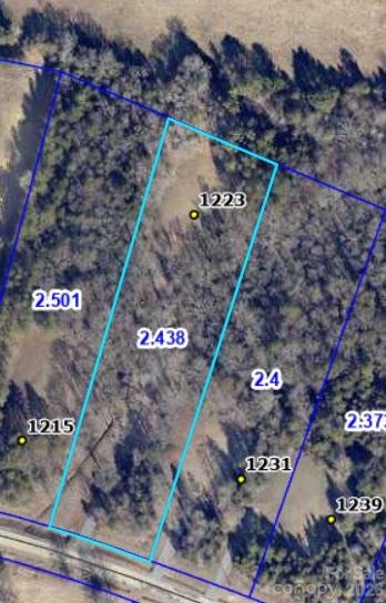 Discover the perfect opportunity to build with 2.39 beautiful acres in Chester County, South Carolina, just minutes from town and Chester State Park. The property is tucked away off Highway 9 offering a quiet rural setting. This property is the ideal setting of privacy and convenience. Enjoy peaceful country living with easy access to town and outdoor recreation.