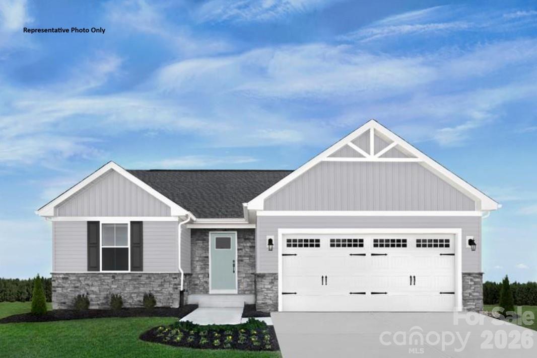 Home of the Month Pricing!! Welcome home to the Grand Bahama where modern one-level living meets a vibrant community lifestyle. This popular open-concept ranch floorplan offers a bright, inviting feel with a stylish kitchen featuring granite countertops, a spacious central island with pull-out shelving, stainless steel GE appliances including a refrigerator, convenient lower pull-out trays, and a built-in trash bin—all flowing seamlessly into the family room for easy entertaining and everyday comfort. Large windows fill the home with natural light, enhancing its warm and pleasant atmosphere. The spacious primary suite accommodates a king-size bed and includes a generous walk-in closet and a private en-suite bath. Beyond the home, Basildon Ranches offers amenities such as a dog park, playground, pickleball courts, and scenic walking trails, all just 15 minutes from Indian Land, SC and Waxhaw for shopping, dining, parks, and historic downtown charm.