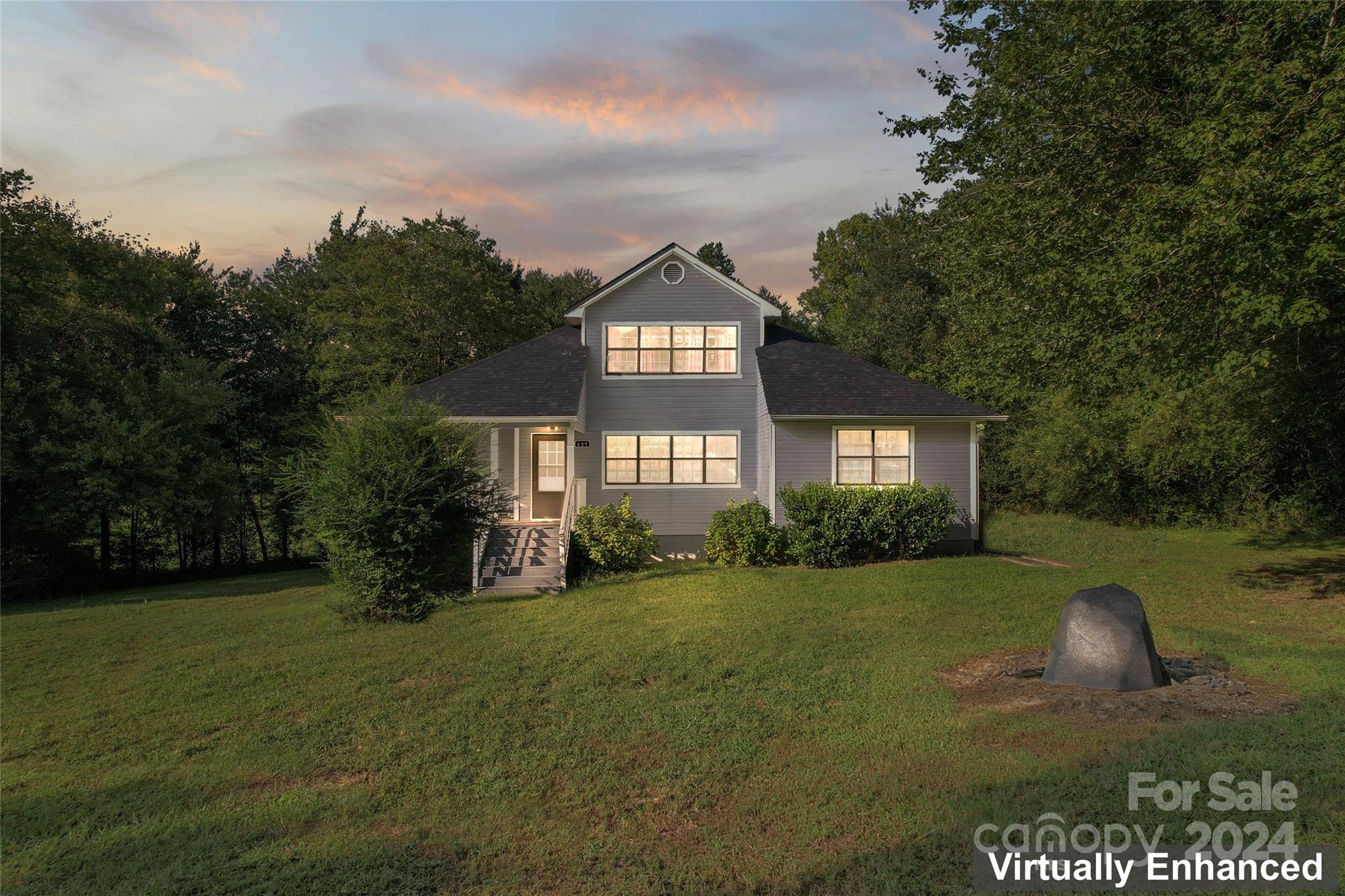 Beautiful 3 bedroom, 2 full baths home nestled in serene countryside, where tranquility meets comfort. SO many upgrades throughout including-new flooring throughout, painted kitchen cabinets, new bathrooms, new paint throughout. Inside discover a thoughtfully designed layout with generous living spaces and an abundance of natural light. The spacious living room, with its 2 story ceilings, creates a luxurious feel. Upstairs is an open, spacious loft that is the perfect space for another living room, exercise space and more!  The heart of the home is the kitchen, featuring modern appliances, and ample cabinetry. Retreat to the primary suite, a peaceful haven with a private en-suite bathroom and a walk-in closet. Two additional bedrooms offer versatility and comfort, perfect for family, guests, or a home office. A second fully updated guest bathroom ensures that everyone has their space. Walk outside to enjoy your oversized front porch and soak in your incredible views!