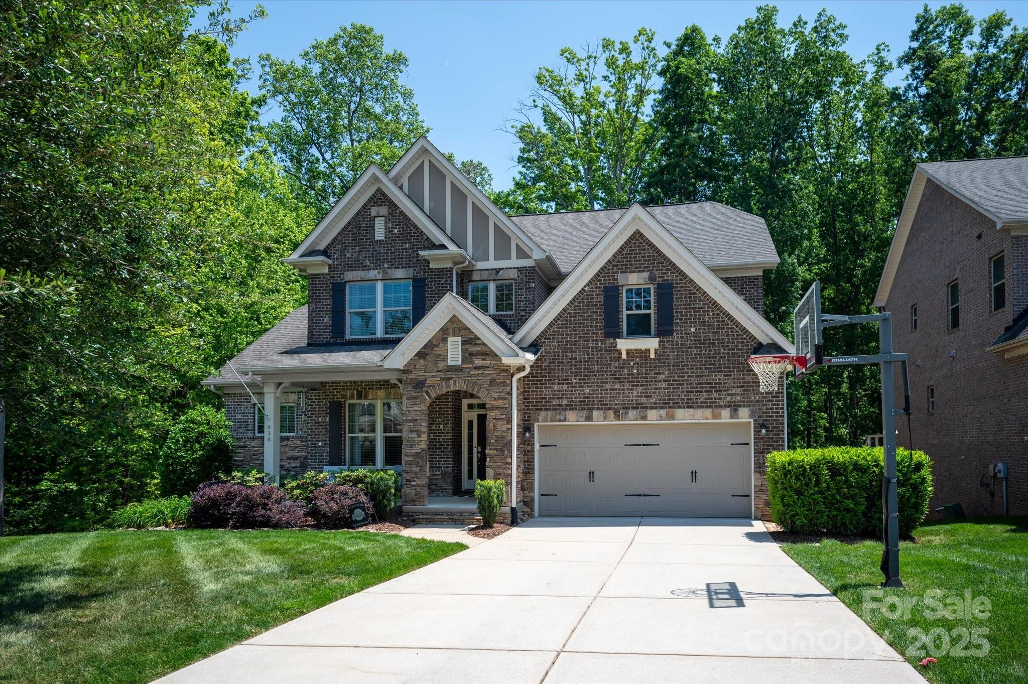 Stunning, open concept home in the highly desirable Barber Rock neighborhood. Extremely private lot surrounded by an abundance of trees w/custom trex deck, fence, flagstone fireplace, firepit & professional landscaping. Large unfinished basement provides extra storage & offers plenty of options to customize. Beautiful site finished hardwoods throughout the 1sr floor. First floor dining,  can also be utilized as an office, spacious great room w/ custom floor to ceiling stone fireplace, chef's kitchen, eat-in breakfast & separate sunroom. Kitchen features white cabinetry, ss appliances, farm sink, gas cooktop, double wall ovens & a DREAM walk-in pantry. Off the kitchen is a drop zone w/ additional storage. 1st floor primary with spa-like bath w/separate vanities, soaking tub, separate shower & walk-in closet with custom cabinetry & built-ins. 2nd floor features oversized bonus, 3 additional bedrooms & 2 baths (1 that is jack-n-jill). Great neighborhood amenities & Indian Land Schools!--